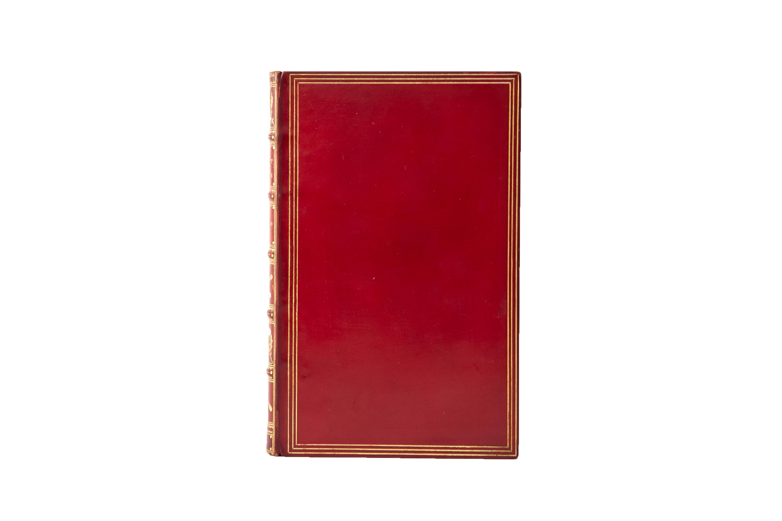 5 Volumes. Charles Dickens, The Christman Books. Mixed Edition. Bound by Zaehnsdorf in full red calf with the covers displaying a gilt-tooled triple border. Raised bands gilt with panels displaying holly, bordering, and label lettering, all