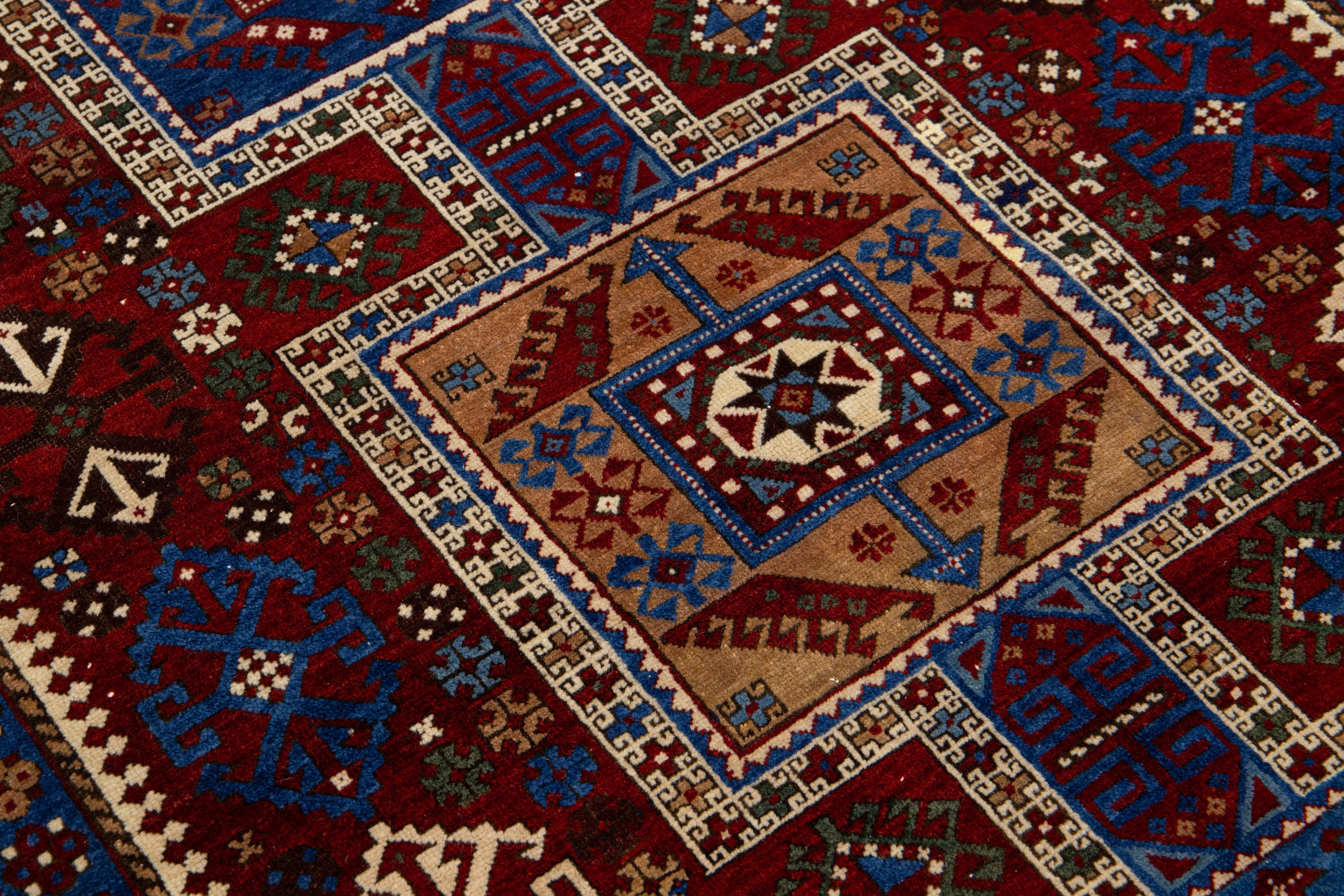 Kazak 5 x 7 Vintage Caucasian Red Wool Rug With Allover Geometric Motif For Sale