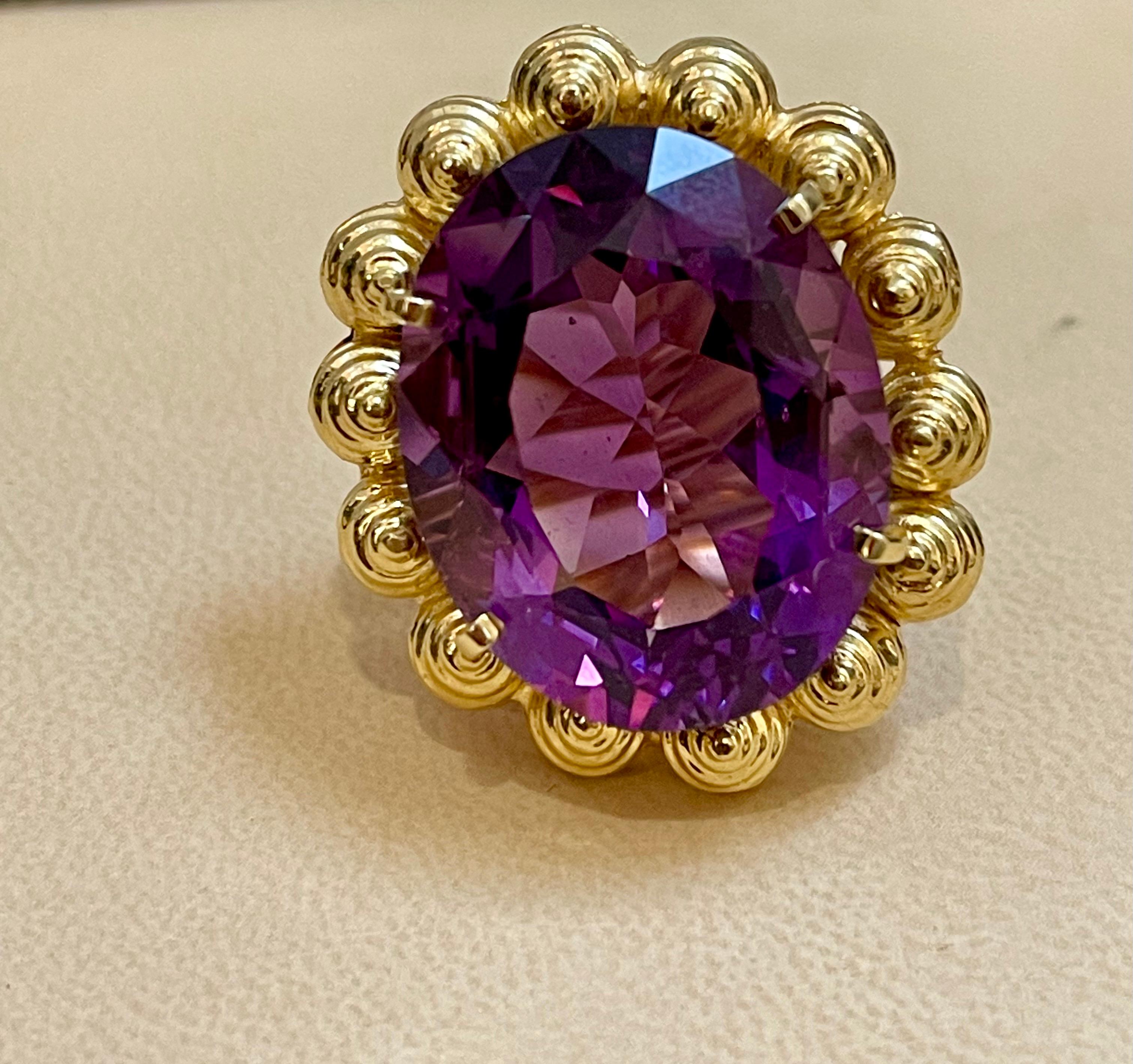 Approximately 50 Carat  Amethyst Cocktail Ring in solid 18 Karat Yellow Gold  29 Grams Size 5
This is a Beautiful Cocktail ring ring which has a large approximately 50  carat of high quality Amethyst . Color and clarity is extremely nice. Large Oval