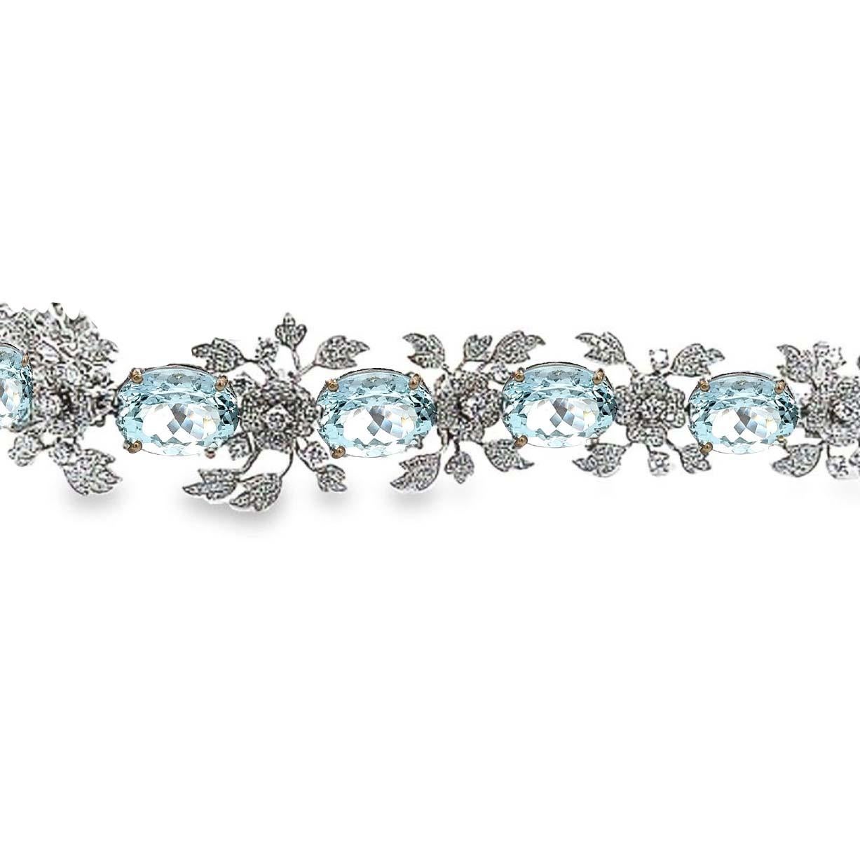 18K white gold Aquamarine and Diamond Bracelet: This exceptional piece features eight captivating bright blue oval aquamarine gemstones, totaling approximately 50 carats. 
Accentuating the beauty of these aquamarines are round brilliant diamonds