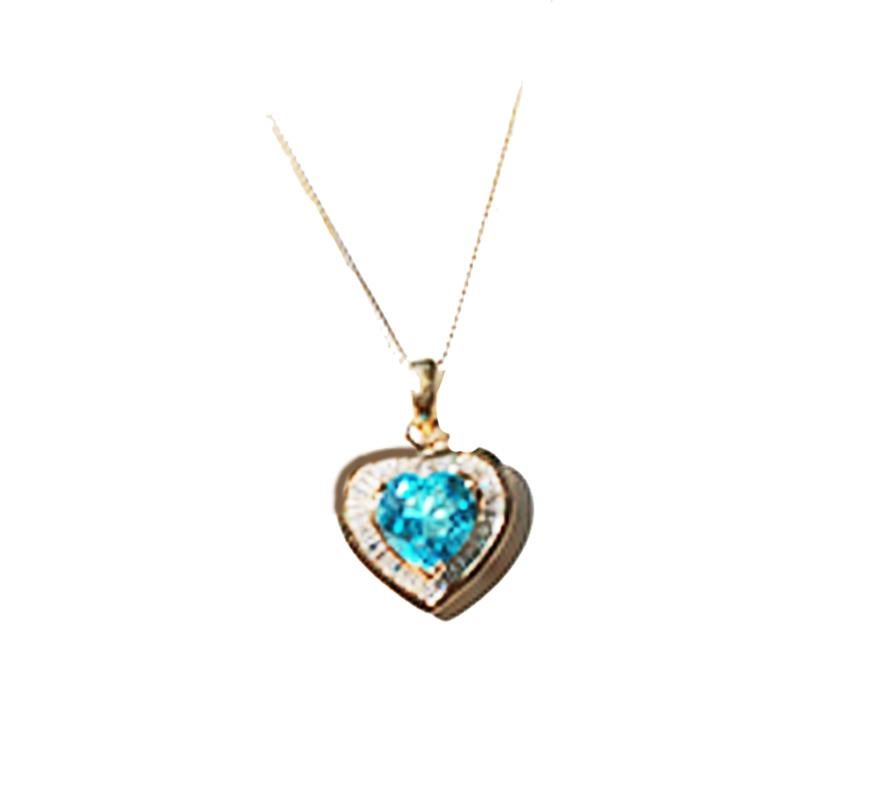 Contemporary .50 Carat Baguette Diamond Heart with Blue Topaz 14 Karat Gold