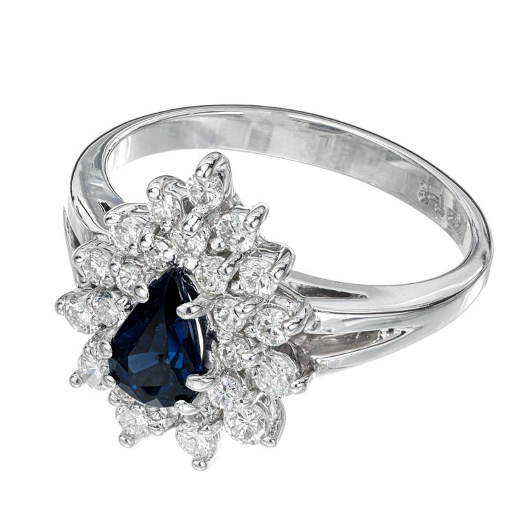 Pear Cut .50 Carat Blue Sapphire Diamond White Gold Halo Ring For Sale
