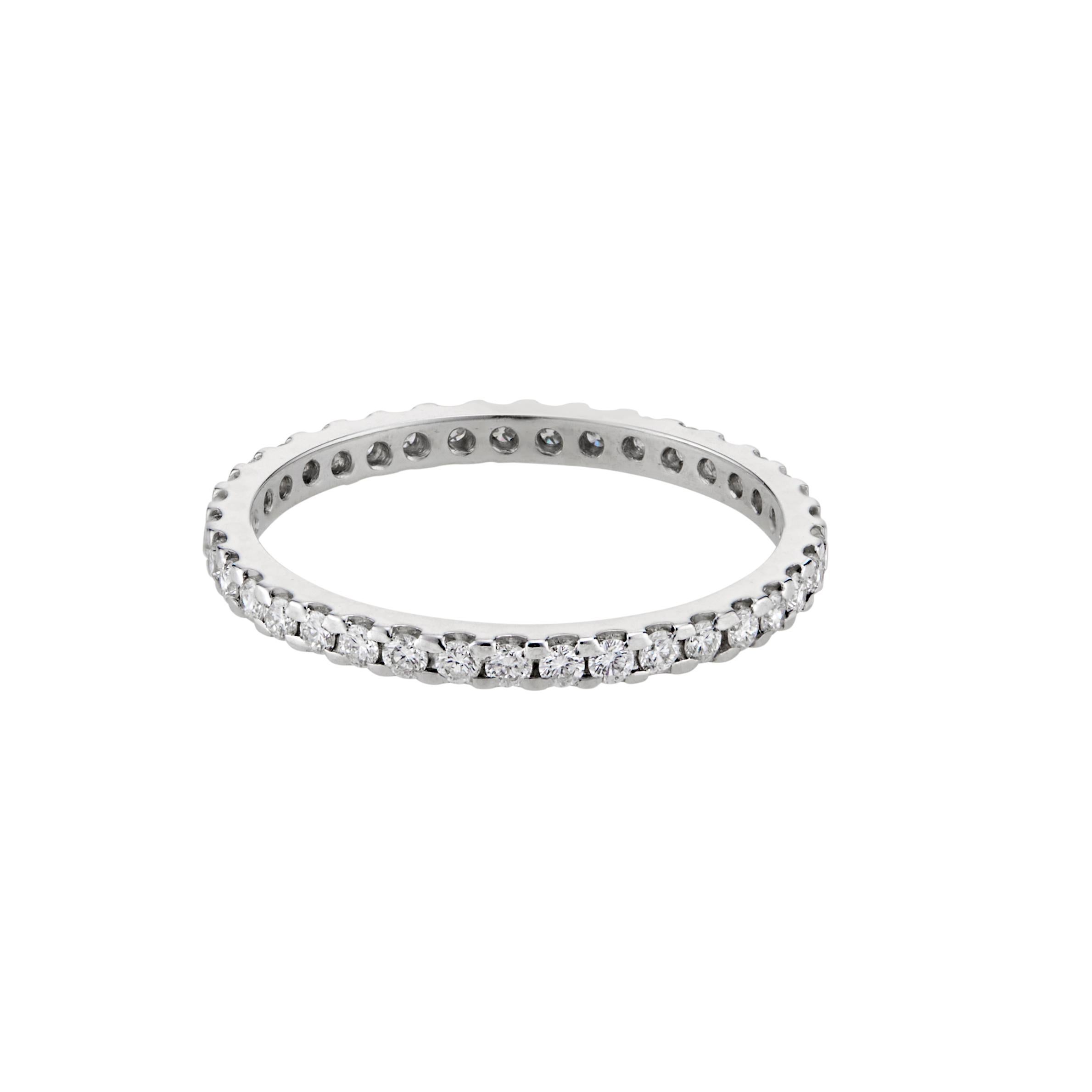 Diamond engagement ring. 37 round brilliant cut diamonds in a common prong platinum diamond eternity setting. 

37 round brilliant cut diamonds, G-H VS approx..50cts
Size 7.25 and not sizable 
Platinum 
2.2 grams
Width at top: 1.8mm
Height at top: