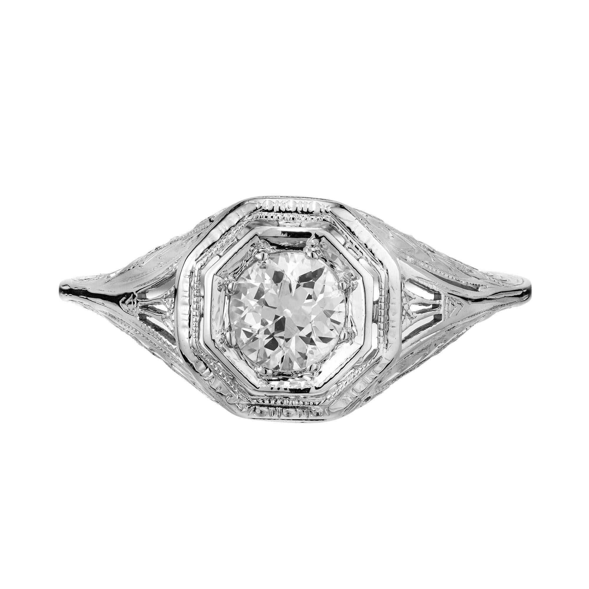 Experience the timeless elegance of the Art Deco era with our 1920's Diamond filigree engagement ring. This exquisite ring features a sparkling .50 carat old European cut diamond, brilliantly set in luxurious platinum, offering a breathtaking