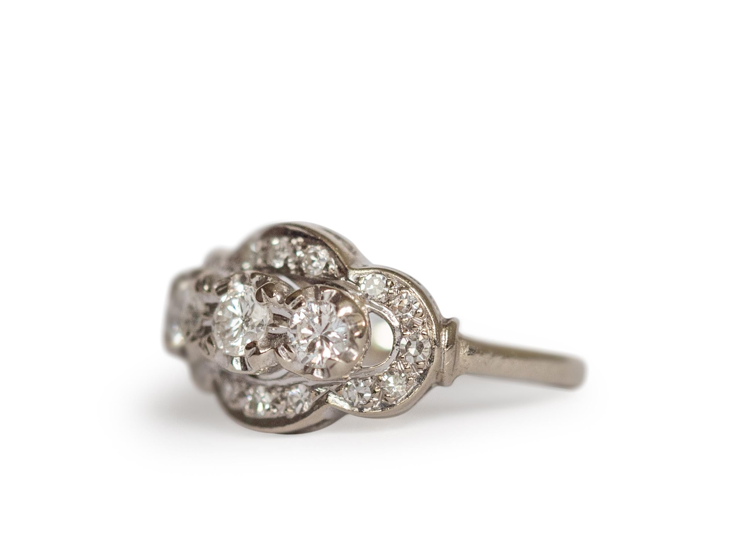 Ring Size: 6
Metal Type: Platinum  [Hallmarked, and Tested]
Weight:  3 grams

Diamond Details:
Weight: .50 carat total weight
Cut: Transitional Rounds
Color: G
Clarity: VS


Finger to Top of Stone Measurement: 6mm
Condition:  Excellent