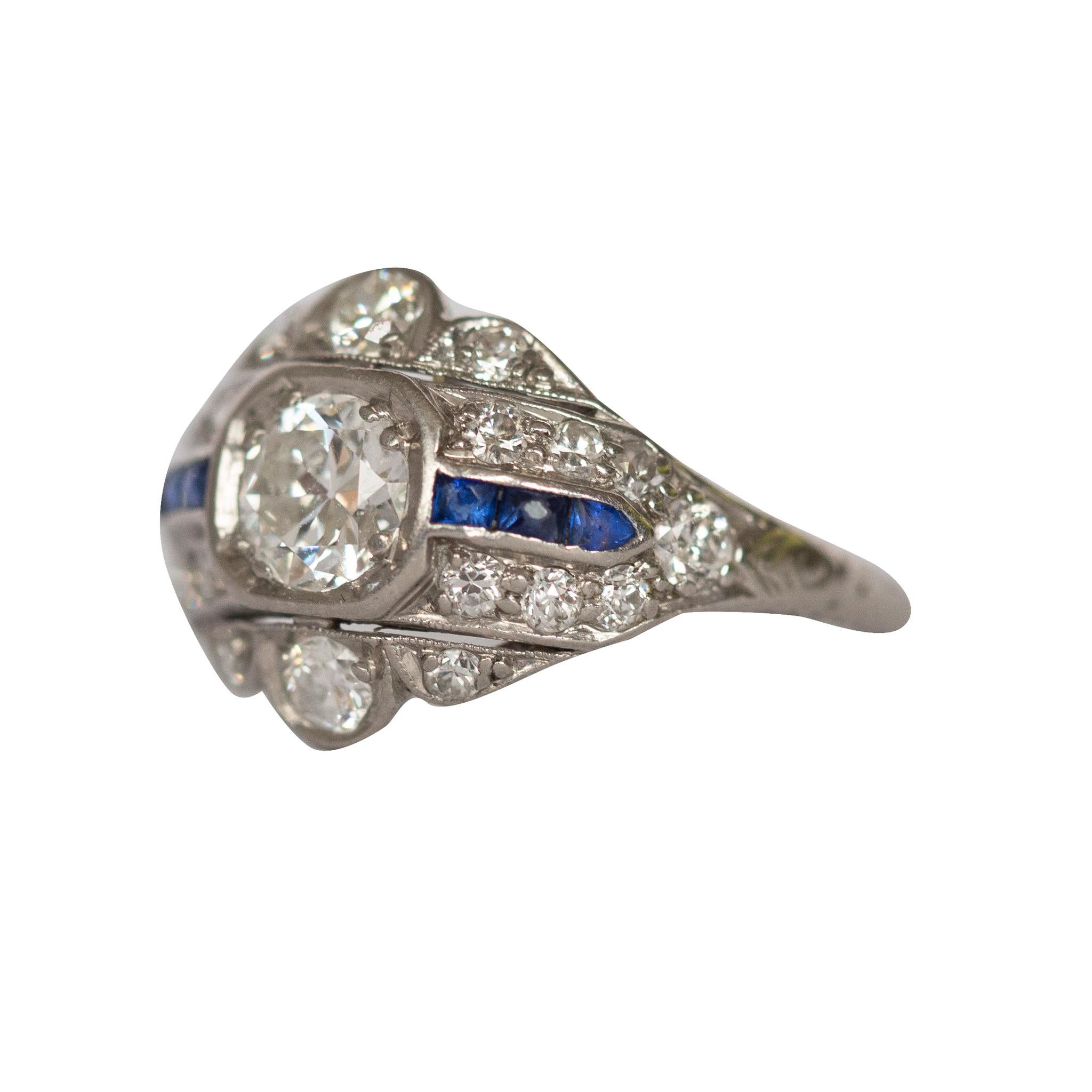 Item Details: 
Ring Size: 5.5
Metal Type: Platinum [Hallmarked, and Tested]
Weight:  2.3 grams

Center Diamond Details:
Weight: .50 carat
Cut: Old European Brilliant
Color: E
Clarity: VS1

Side Diamond Details:
Weight: .25 carat, total weight
Cut: