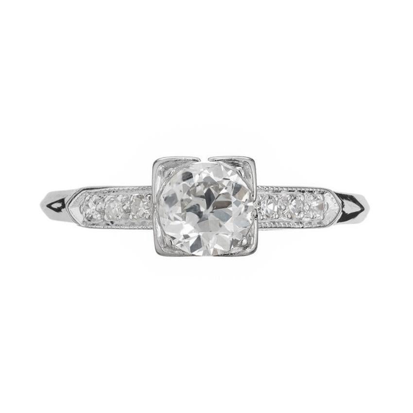 Original 1920's Art Deco diamond engagement ring. .50ct Old European cut round diamond in a solid platinum handmade engagement setting. Accented with 3 round single cut diamonds on each. A simple but yet beautiful example of the Art Deco era. 

1