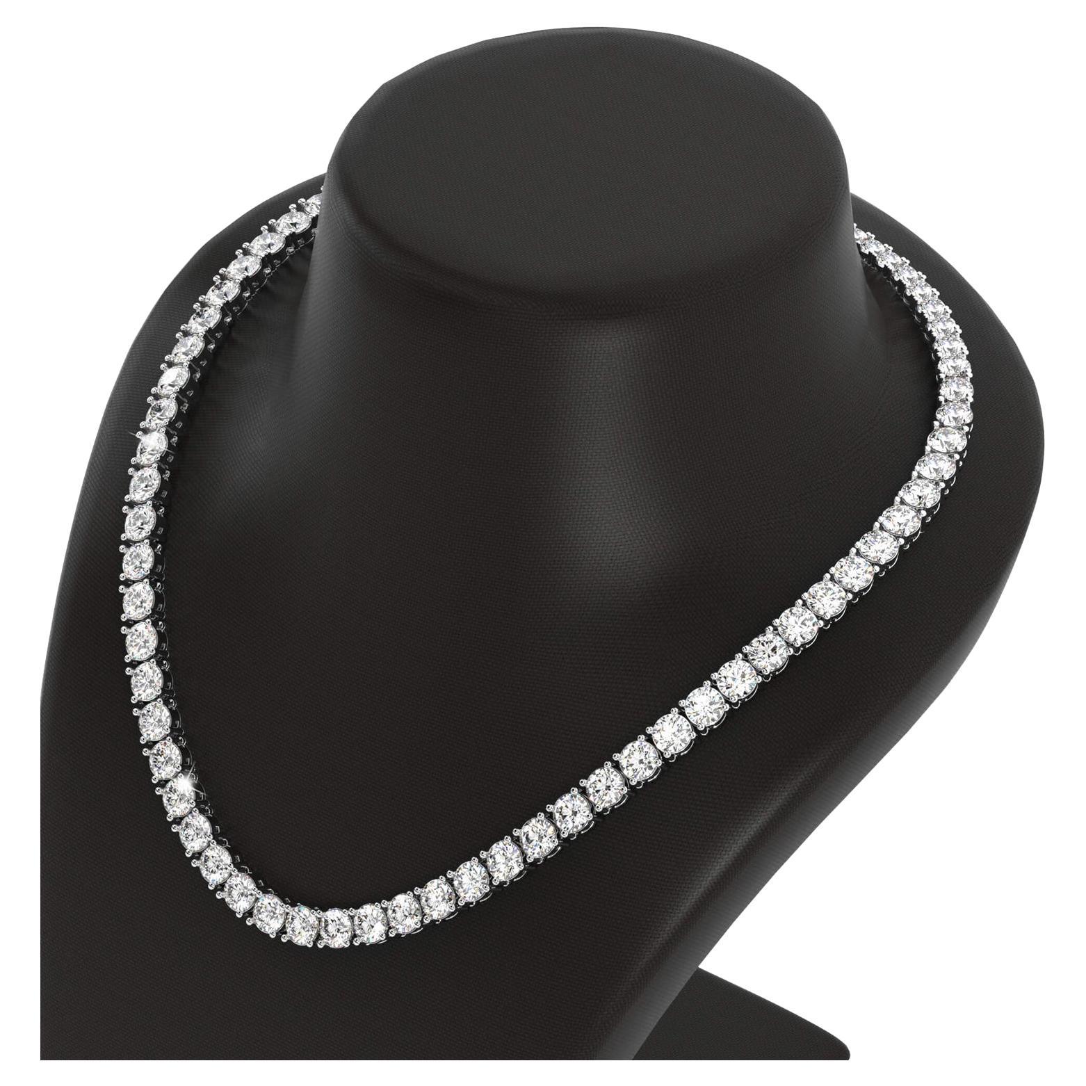 Indulge in the timeless elegance of our exquisite 24-inch Tennis necklace crafted in lustrous 18K white gold. Adorned with an array of meticulously set round diamonds, totaling an impressive 49.09 carats, each stone held securely in a delicate