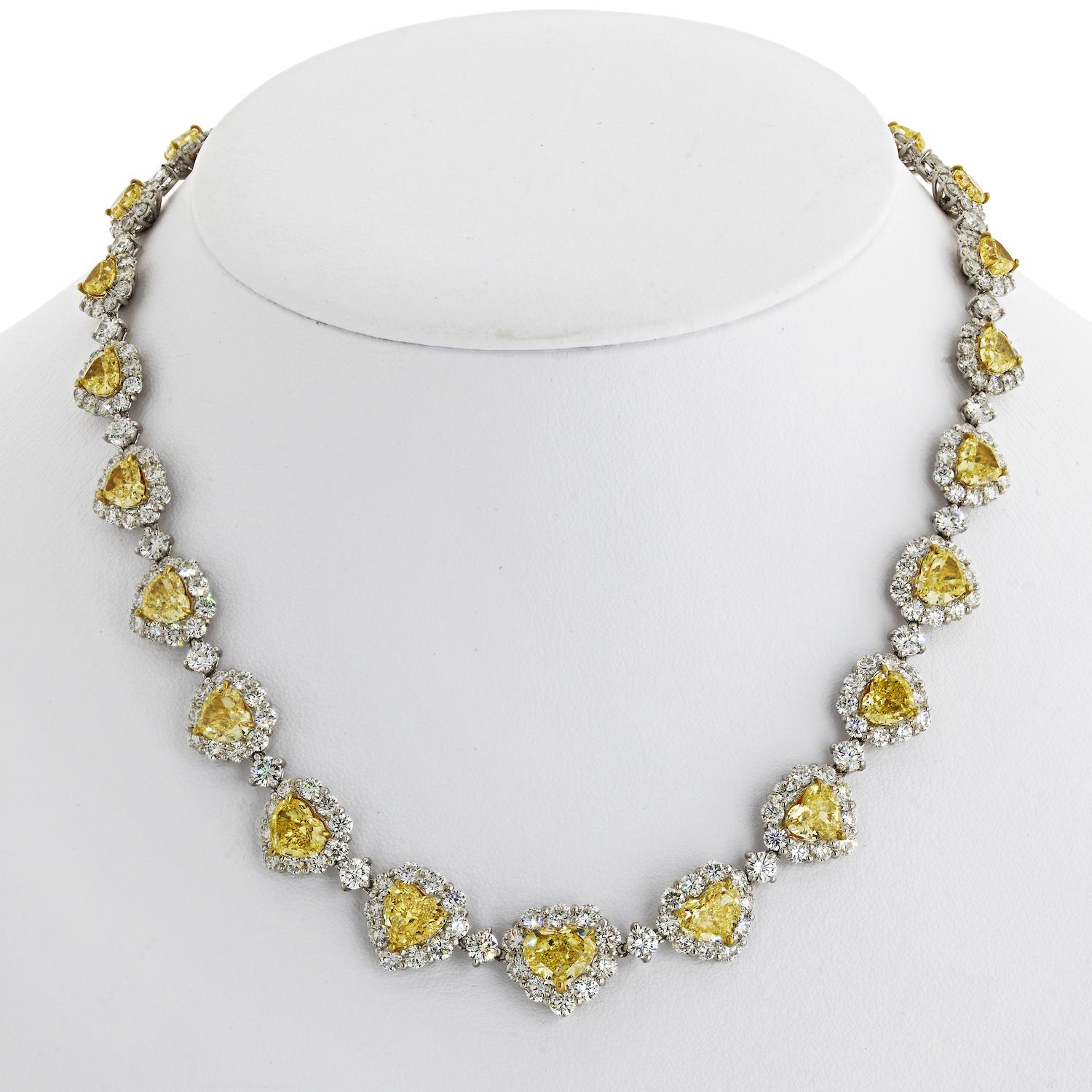 50 carat Fancy Intense Yellow Heart And White Diamond Infinity Necklace.

It doesn't get any more regal than this stunning infinity necklace. Heart-shaped yellow diamonds are surrounded by round white diamonds set in 18k white gold hearts. Take a
