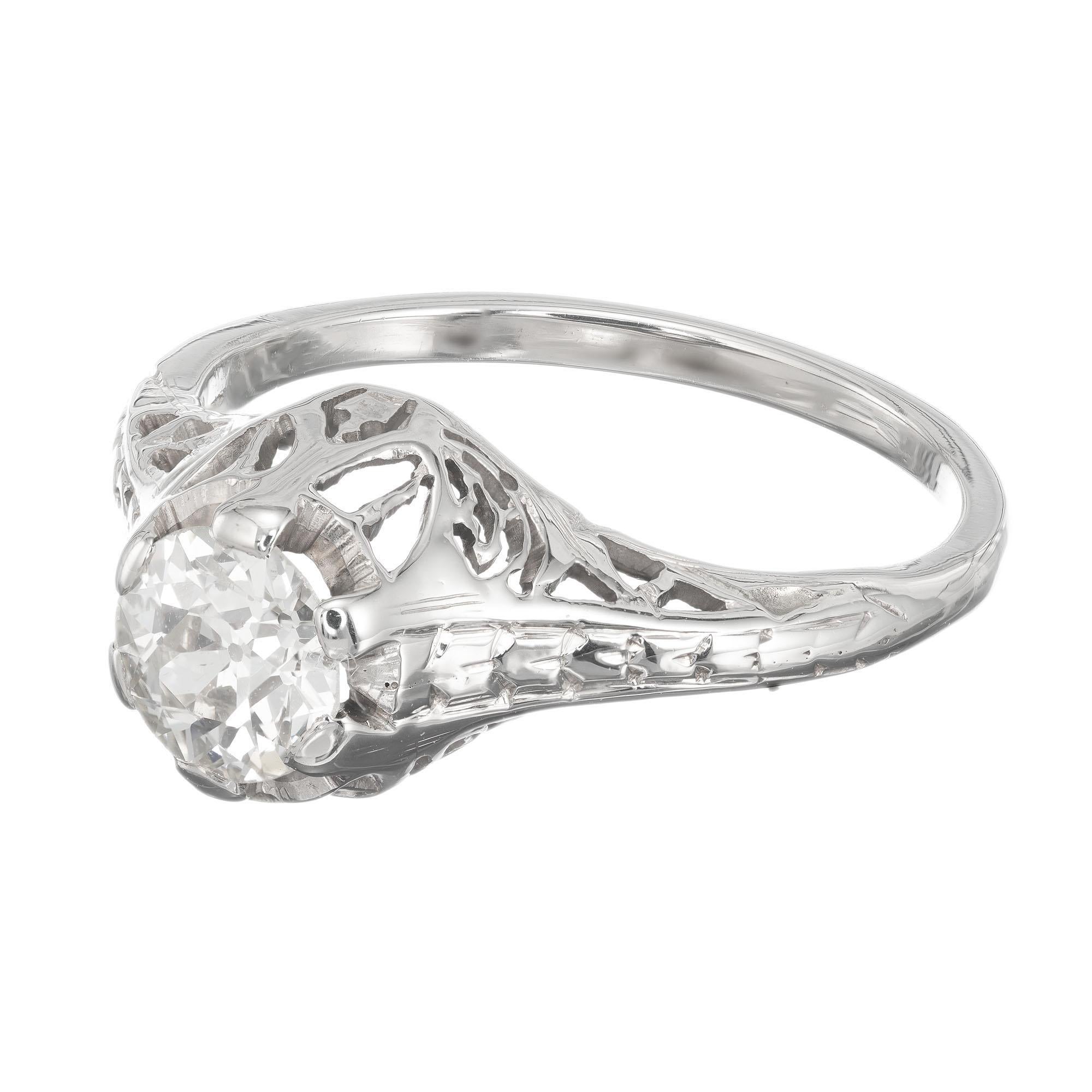1940's diamond engagement ring.  Old European cut center diamond in a filigree late Art Deco 14k white gold setting. EGL certified. 

1 diamond old European cut, approx. total weight .51cts, I, VS2, 5.34 x 5.32 x 3.10mm. EGL certificate # US