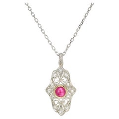 Antique .50 Carat Round Cabochon Ruby Diamond Pierced Engraved Platinum Pendant Necklace