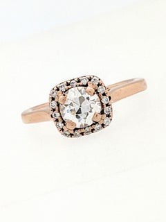 .50 Carat Round Diamond 14 Karat Rose Gold Diamond Halo Engagement Ring