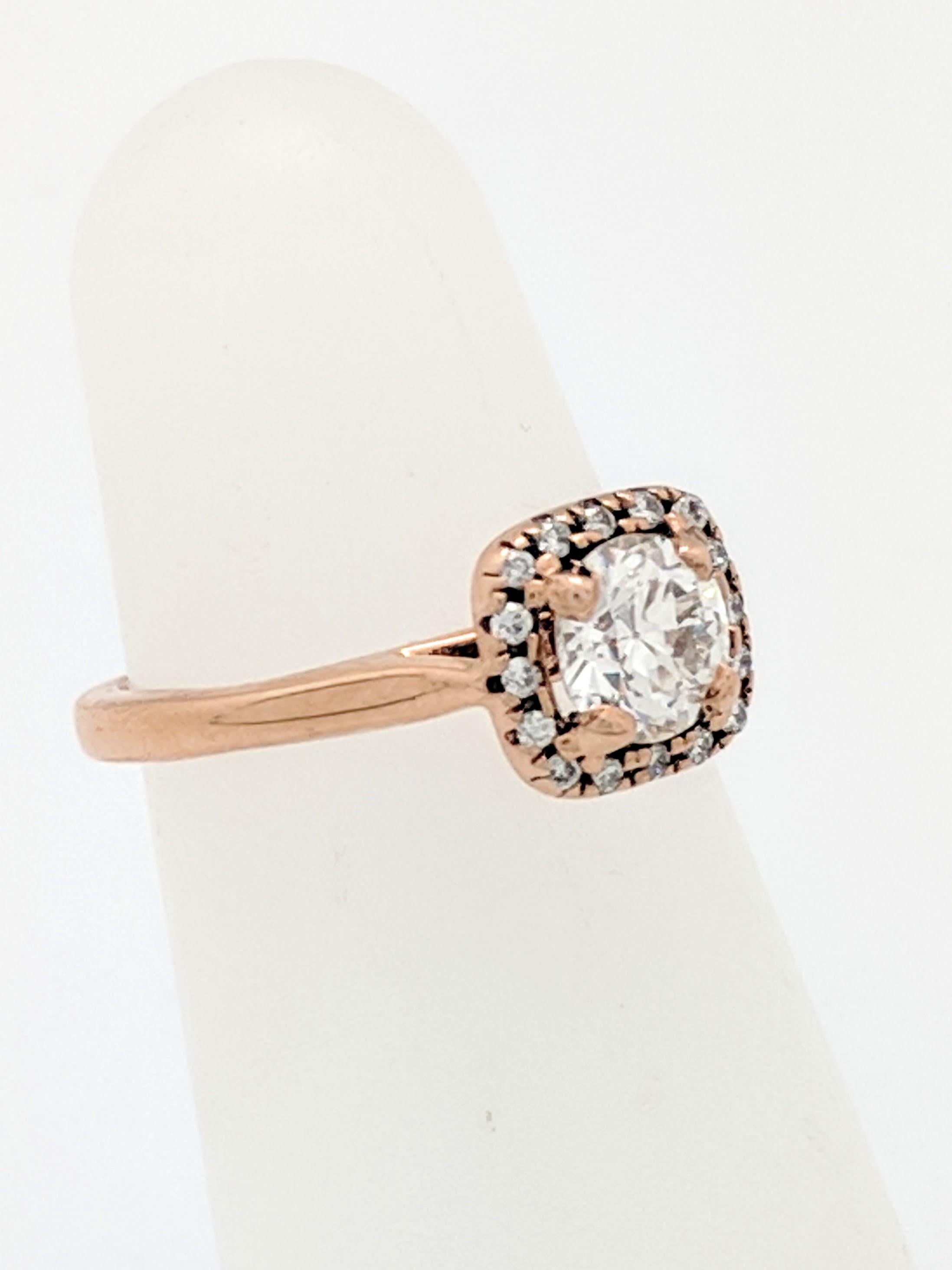 Contemporary .50 Carat Round Diamond 14 Karat Rose Gold Diamond Halo Engagement Ring For Sale