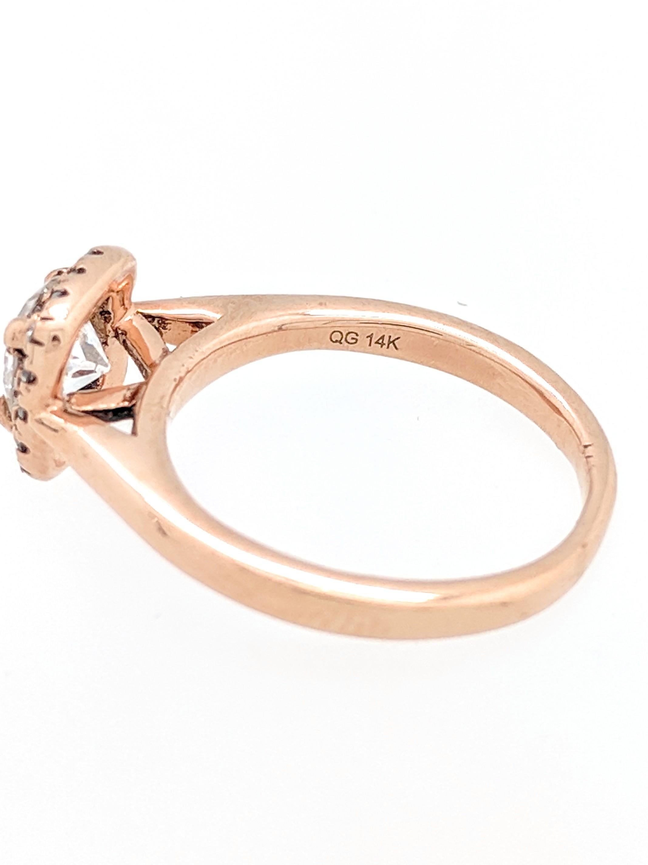 Women's .50 Carat Round Diamond 14 Karat Rose Gold Diamond Halo Engagement Ring For Sale