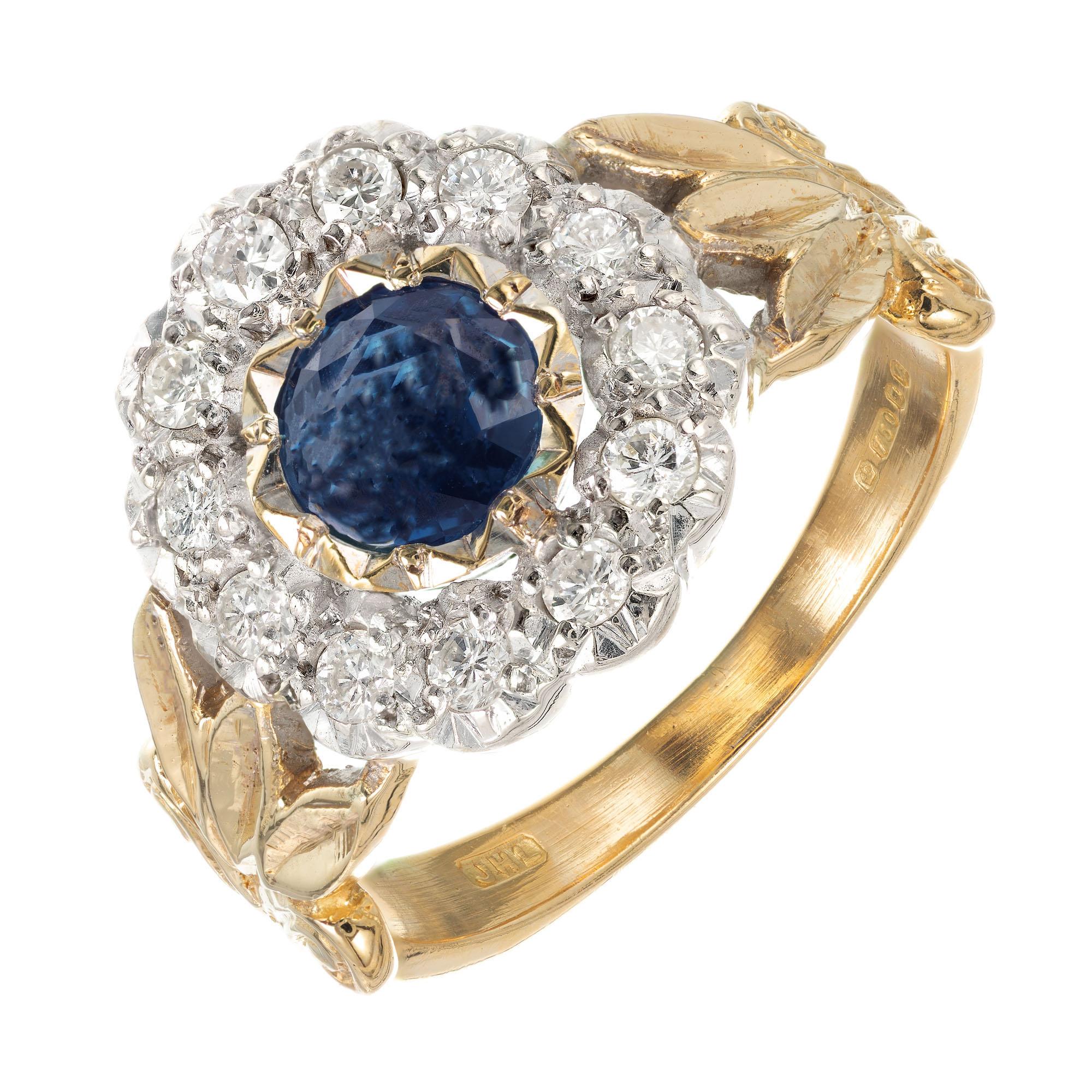 Sapphire and diamond engagement ring. 18k white and yellow gold handmade setting with a round center sapphire and round diamond halo. Circa 1940's

1 round brilliant cut blue sapphire, approx. .50ct
12 round brilliant cut diamonds H-I SI, approx.