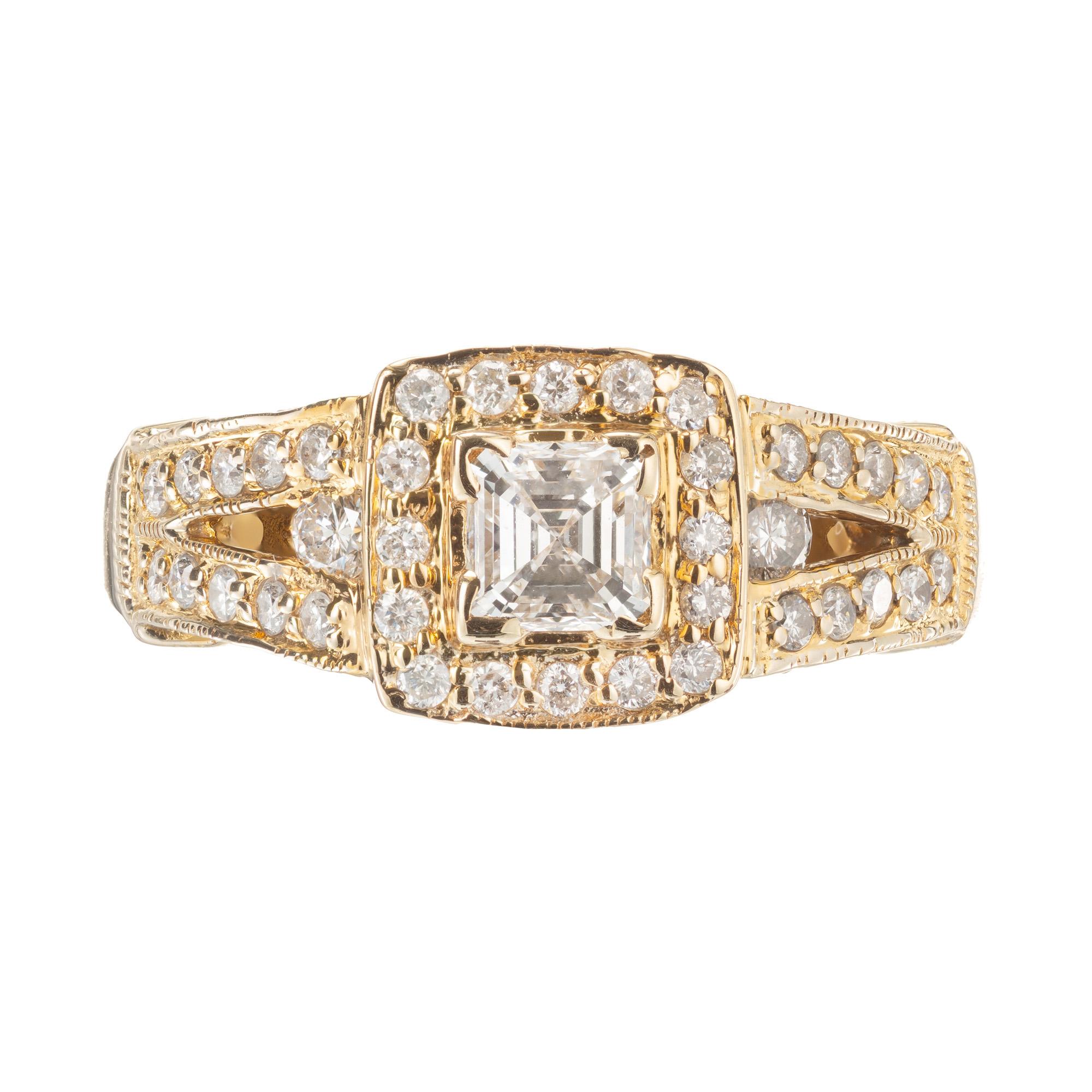 .50ct diamond engagement ring. Step cut square center diamond with a halo of round diamonds and princess cut accent diamonds along the shank in a 14k yellow gold setting.

1 step cut square diamond I VS , approx. .50ct 
75 round brilliant cut