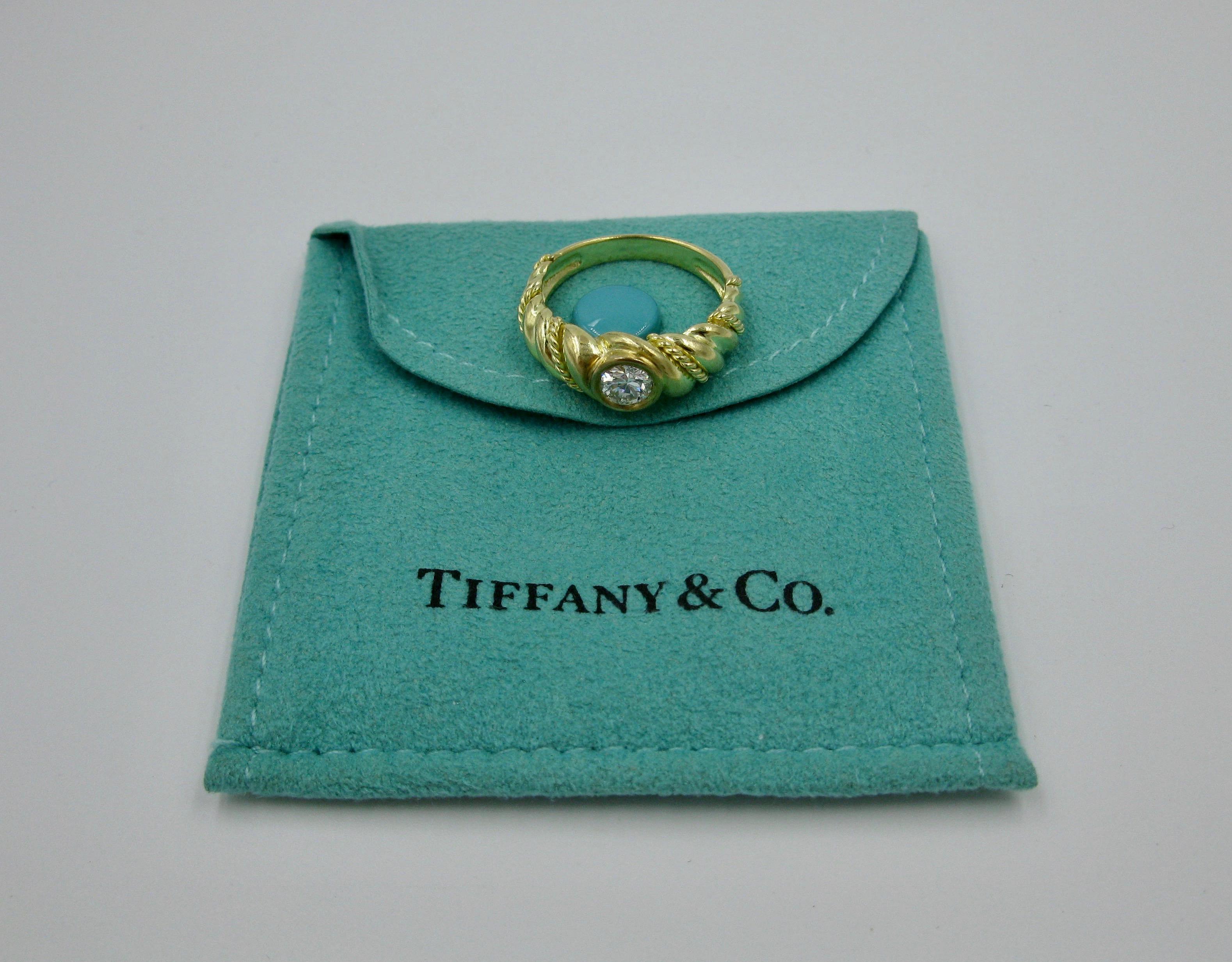 This is one of the most beautiful Yellow Gold Tiffany & Co. Wedding Engagement Rings we have seen with a 1/2 Carat Round Brilliant Cut Tiffany Diamond.  This gorgeous Tiffany diamond is E color, VERY white!  The diamond is VS clarity which is