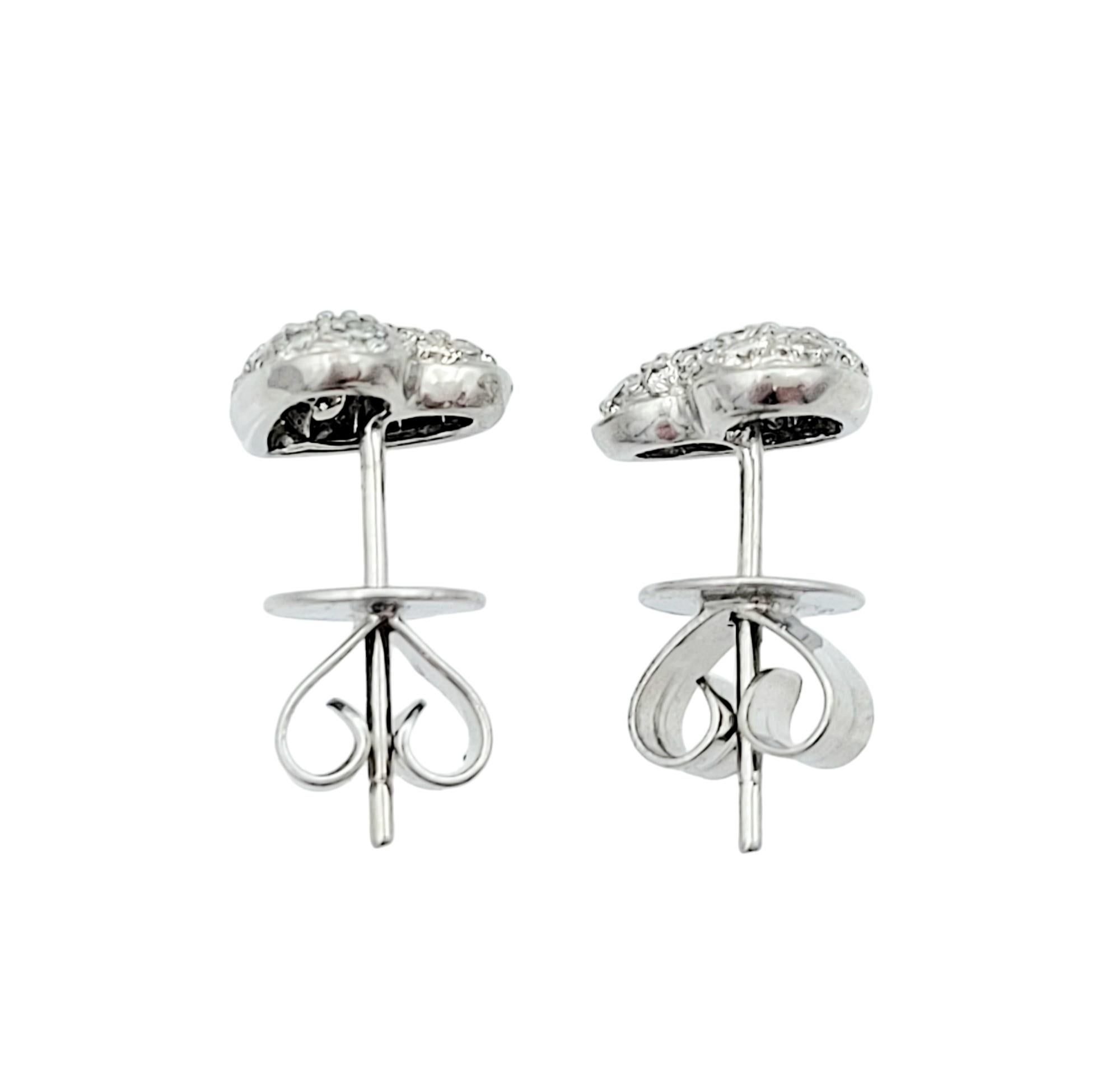 Round Cut .50 Carat Total Pavé Diamond Heart Stud Earrings Set in 18 Karat White Gold For Sale