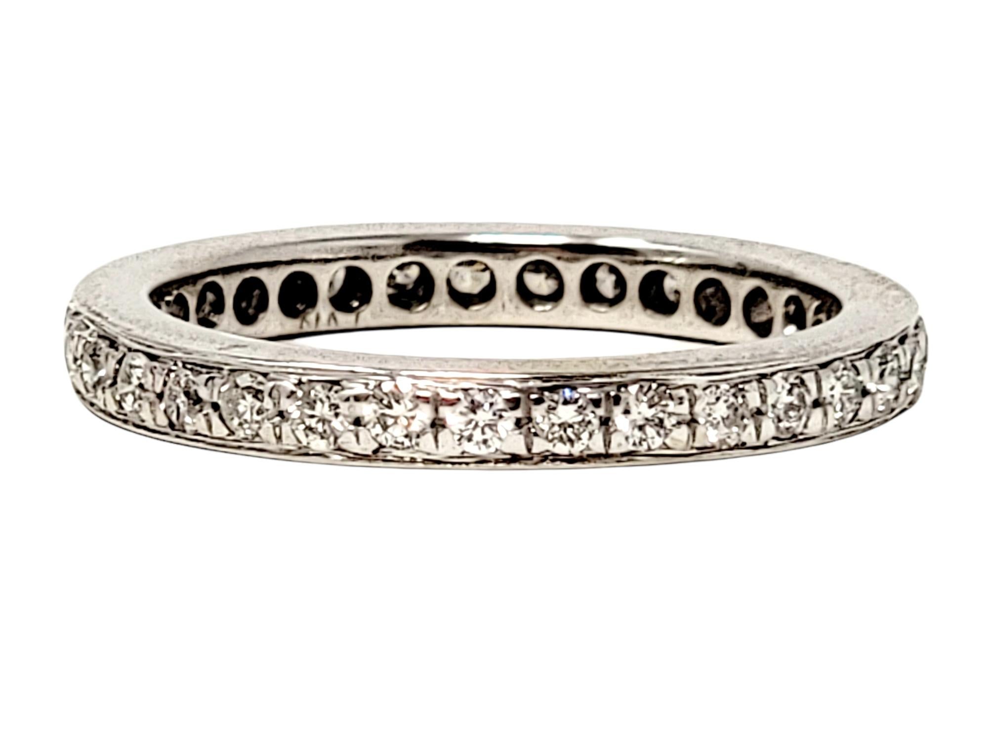 Ring size: 5.5

Classic sparkling diamond eternity band ring. This timeless beauty features icy white diamonds set in a continuous circle all the way around the band. Pair this versatile piece with your engagement ring for a little extra pop of