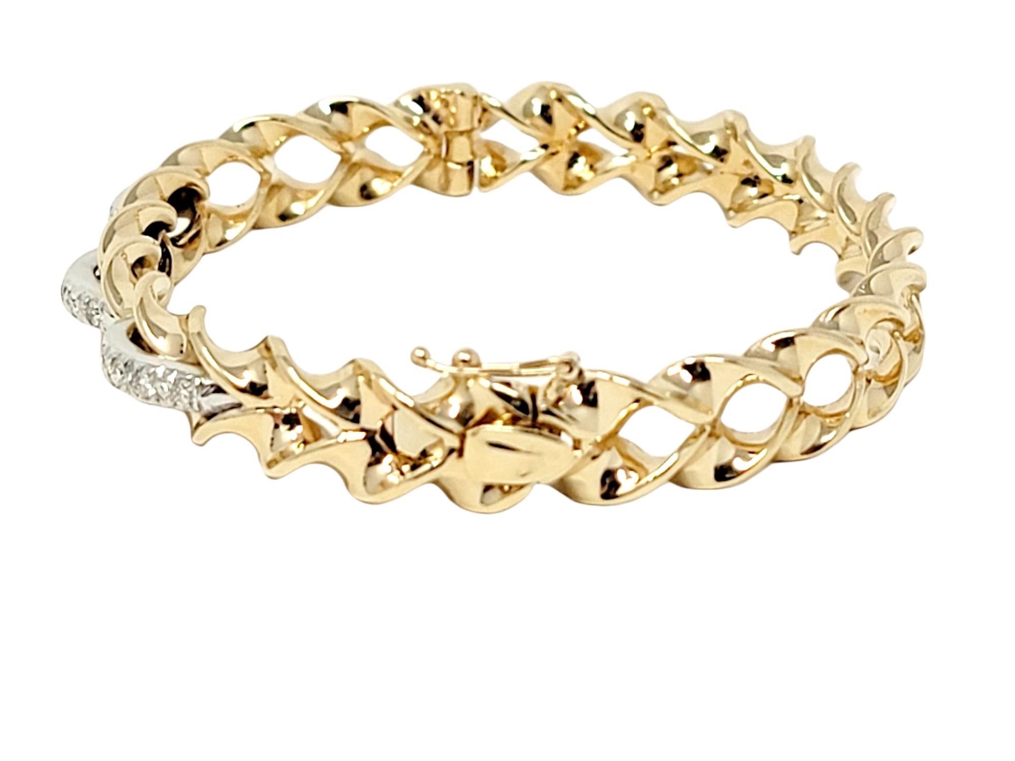 Contemporary .50 Carat Total Round Diamond Twisted Hinged Bangle Bracelet in Yellow Gold For Sale