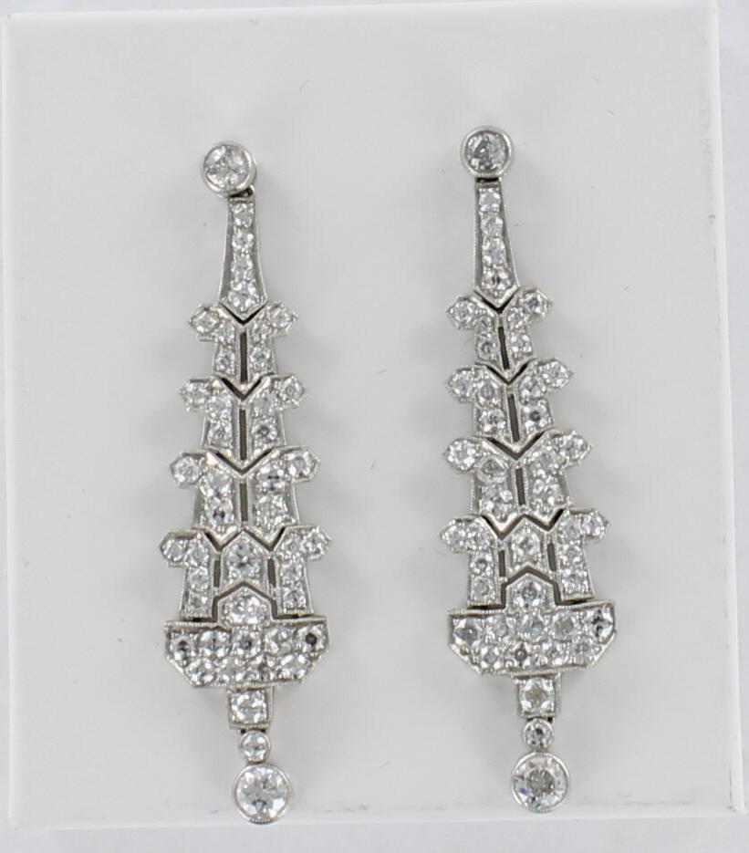 Old European Cut  5.0 Carat Total Weight Diamond Dangle Earrings Set in Platinum For Sale