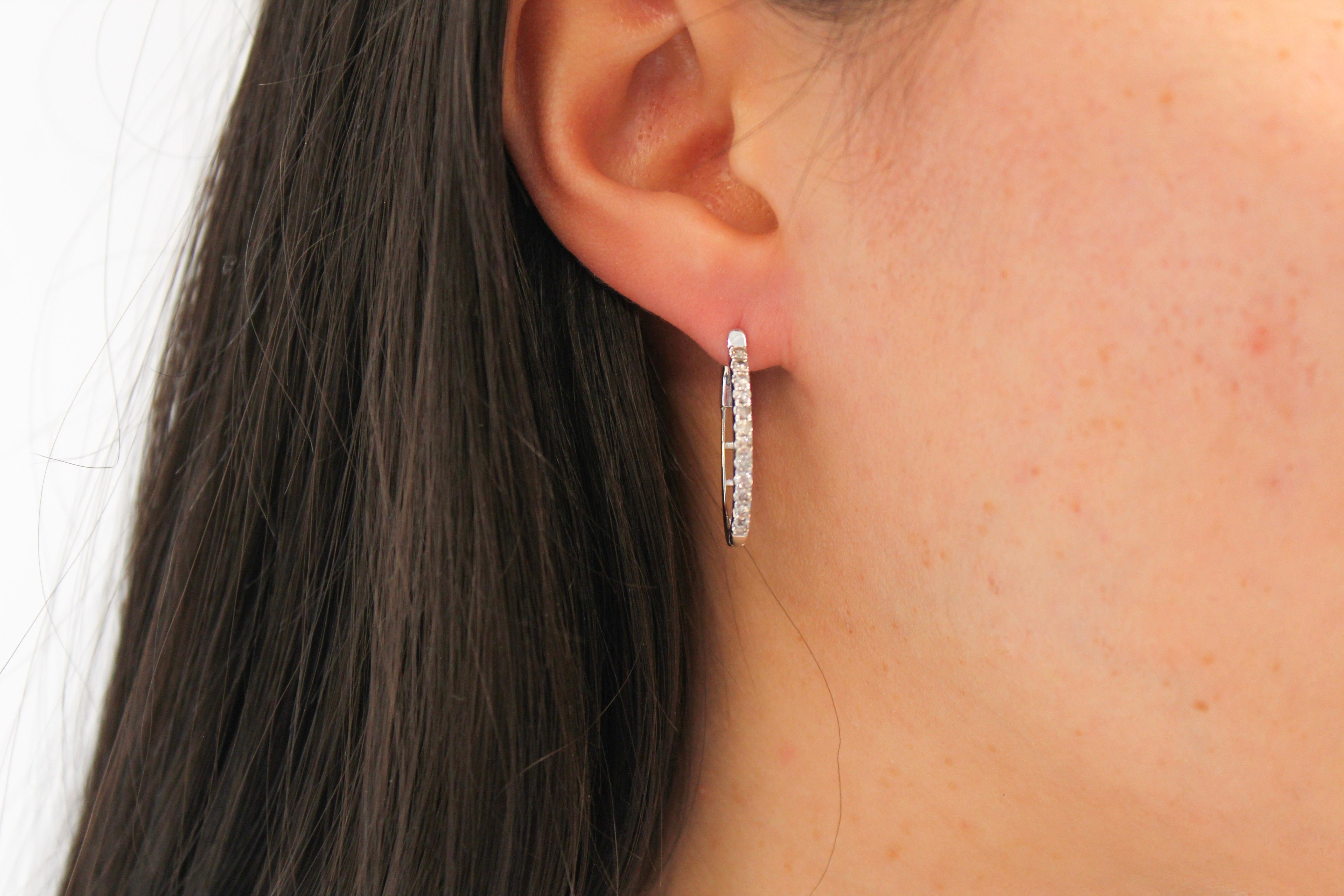 Contemporary  .50 Carat Total Weight Diamond Outside Oval Hoop Earrings in 14 Karat Gold				 For Sale