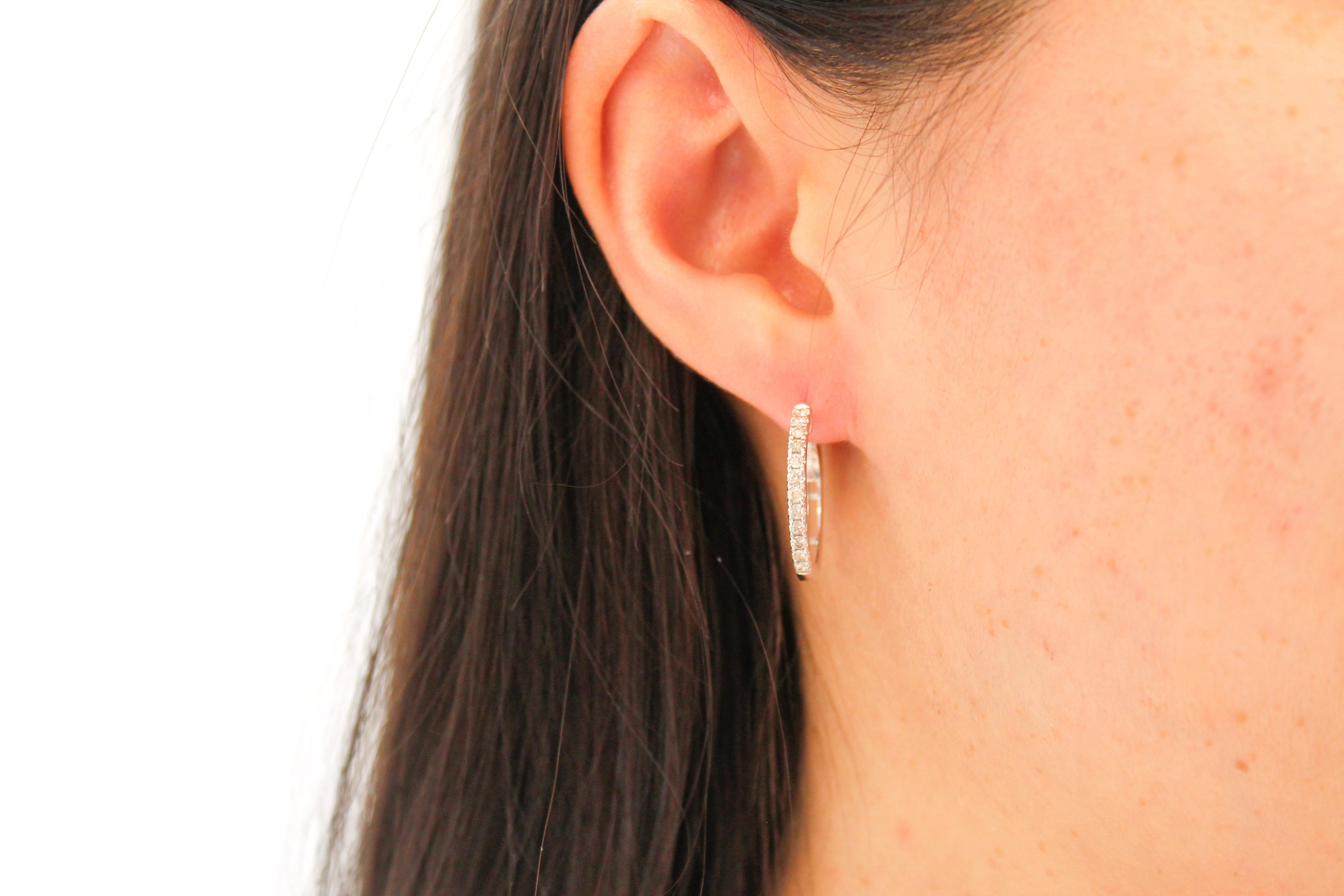 Contemporary  .50 Carat Total Weight Diamond Outside Round Hoop Earrings in 14 Karat Gold For Sale