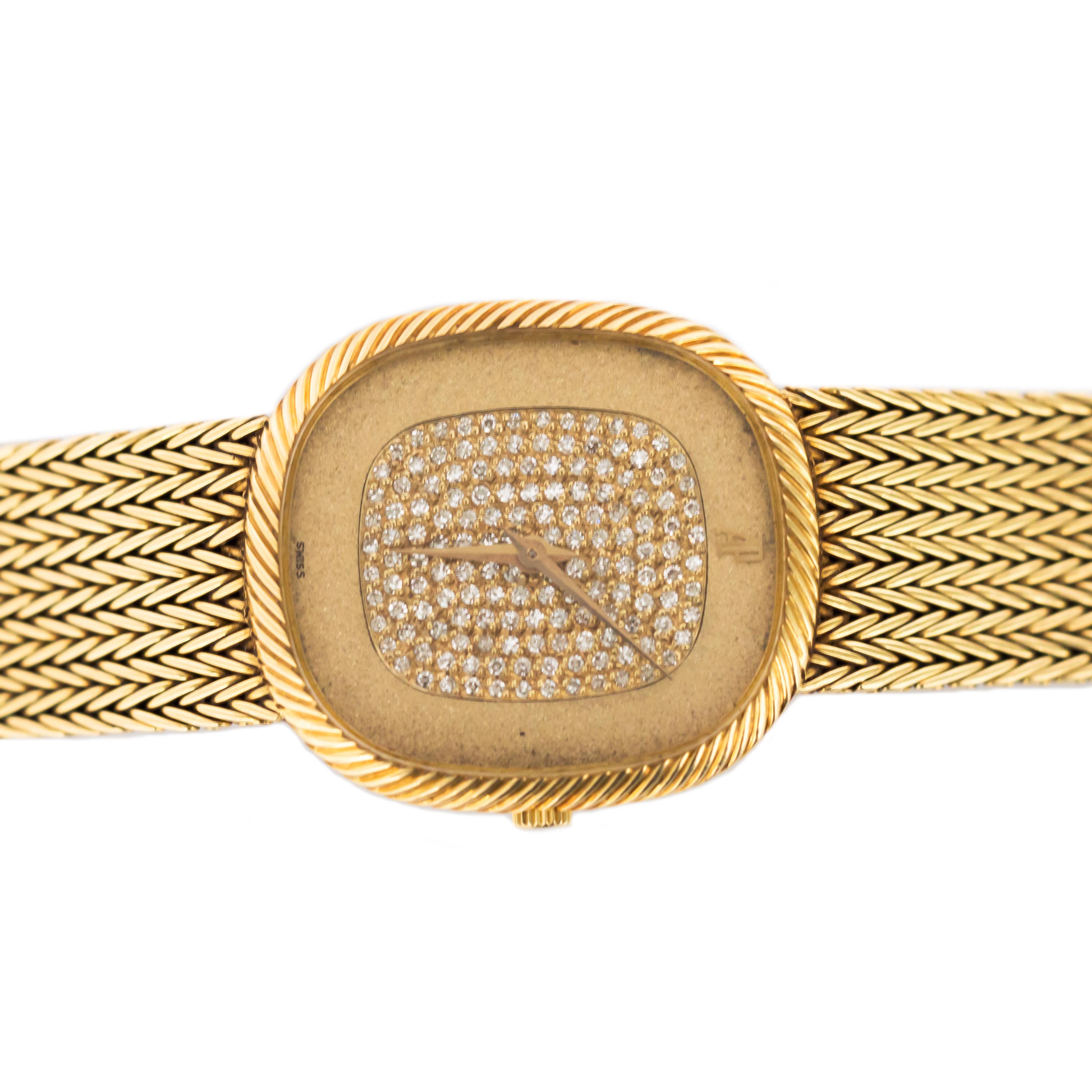 Audemars Piguet Diamond and Gold Watch 
Metal: 18 Karat Yellow Gold 
Weight: 79.8 grams 
Length: 7.45 inches 

Stones Detail:
Shape: Round Brilliant 
Total Carat Weight: .50 carat, total weight
Color: E-F
Clarity: VS1
