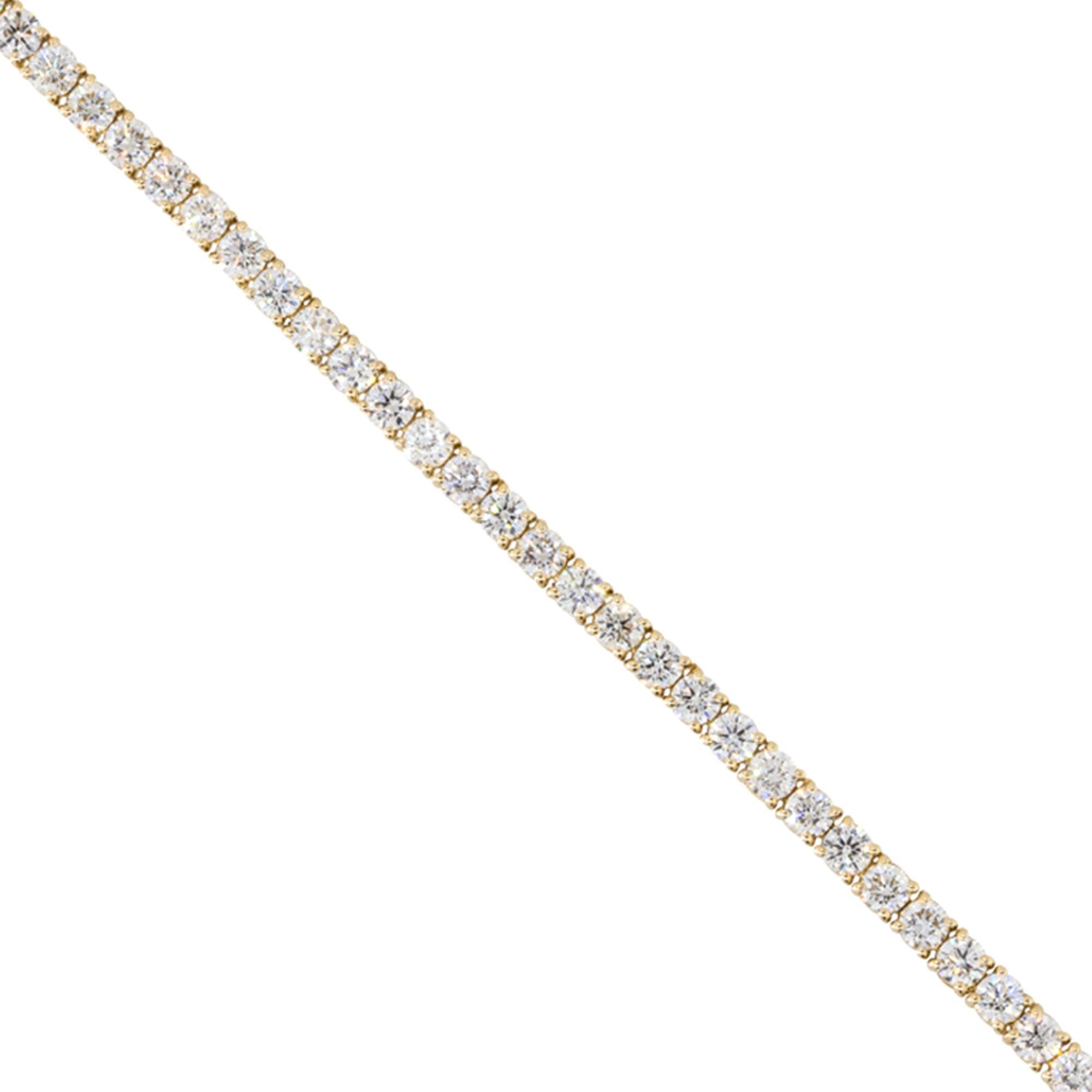 Material: 14k Yellow gold
Diamond Details: Approx. 5.0ctw of round cut Diamonds. Diamonds are G/H in color and VS in clarity.
Clasps: Tongue in box clasp
Total Weight: 8.0g (5.2dwt)
Length: 7