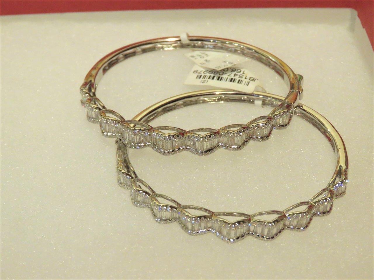 The Following Items we are offering are these Beautiful Rare Important 18KT White Gold Brilliant Pair of Fancy Cut Diamond Bangle Bracelets. Bangles are comprised of Magnificent Rare Gorgeous Natural Rare Fancy Glittering Diamonds!!! T.C.W. Approx