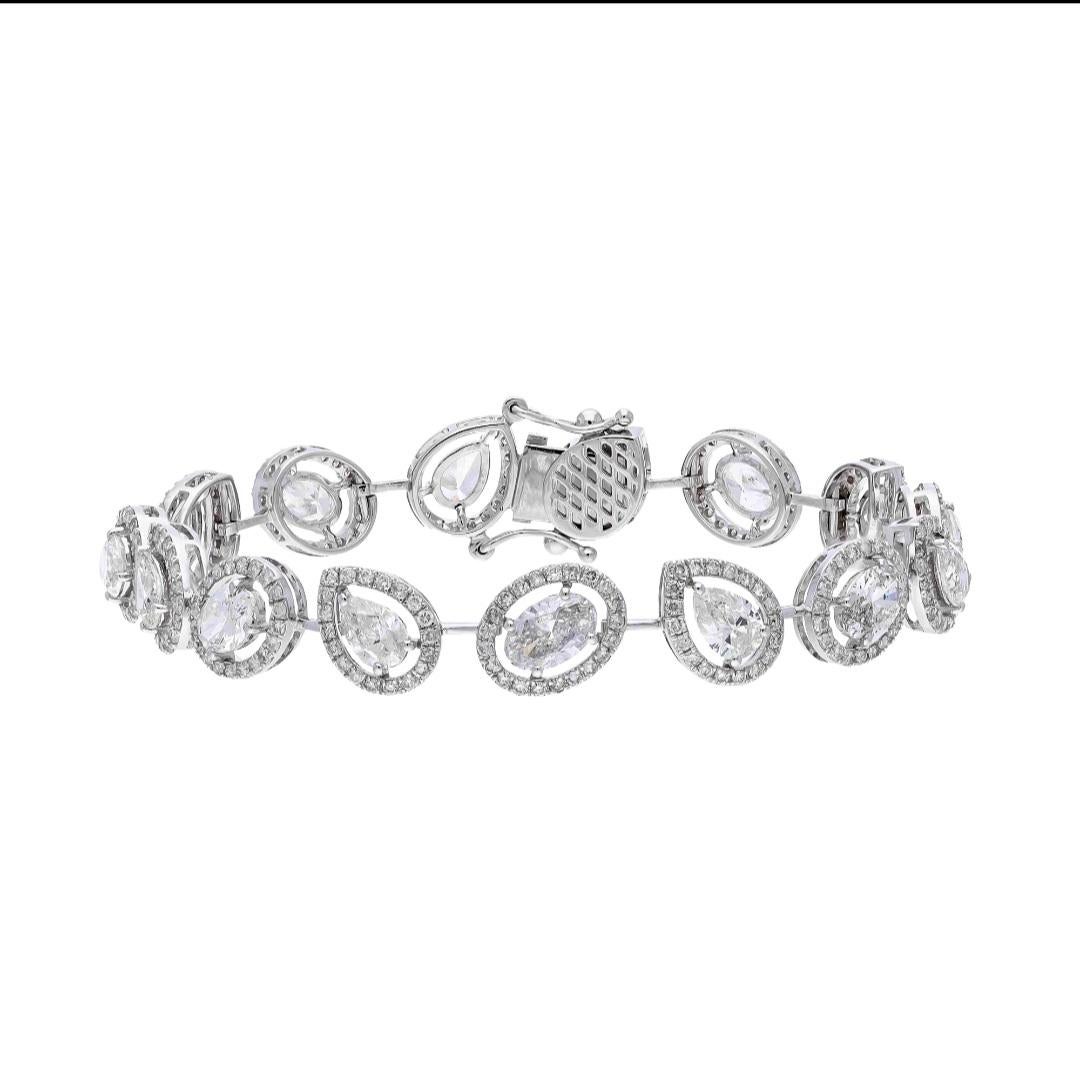 Superb 50 pointers ( vsi purity and G colour ) natutal diamond bracelet will enlighten your hand

diamonds ;

50 pointers ( 6.81 carats )

rounds ( 1.98 carats)

gold ( 13.72 gms)



It’s very hard to capture the true color and luster of the stone,
