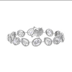 50 Pointers natural diamond pears and oval tennis bracelet in 18k Gold