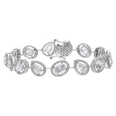 50 pointers natural diamond pears and oval tennis bracelet in 18k gold