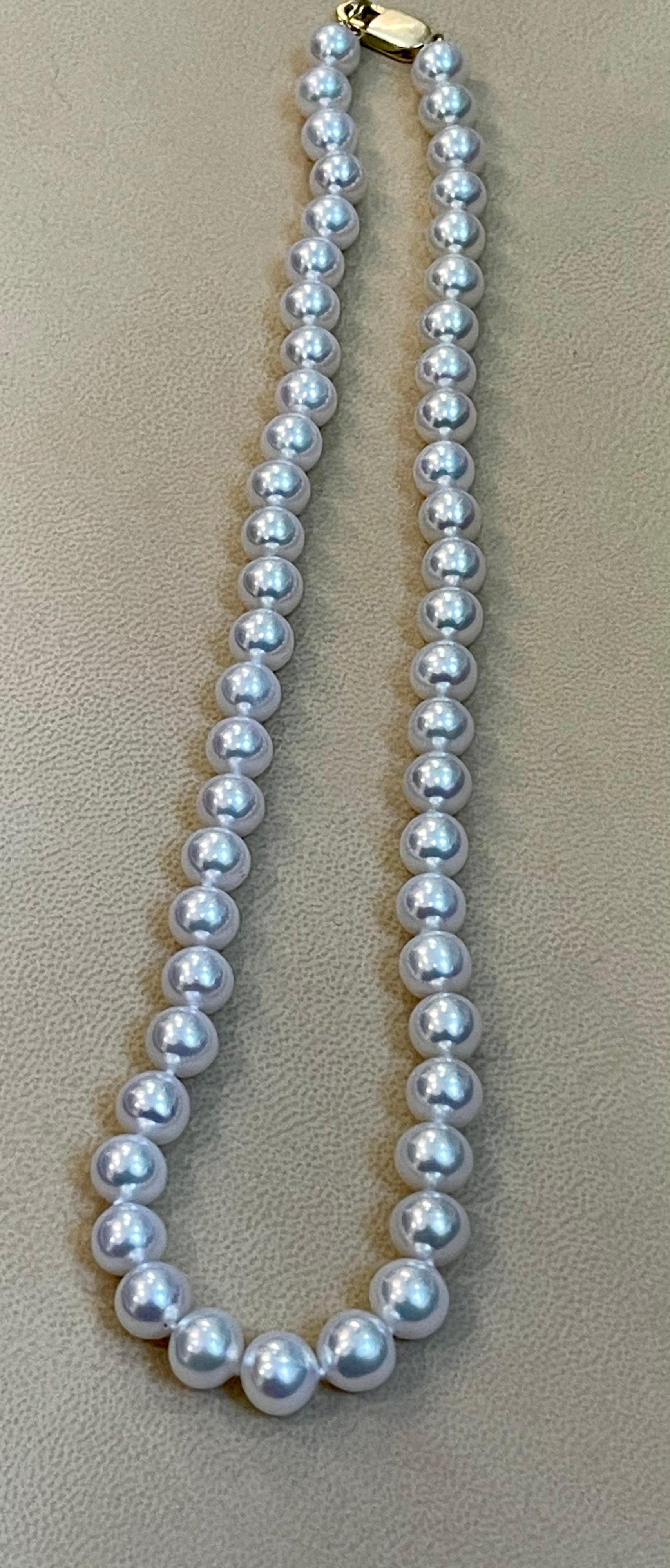 Round Cut 50 Round Akoya Pearls Strand Necklace Set in 14 Karat Gold Clasp For Sale