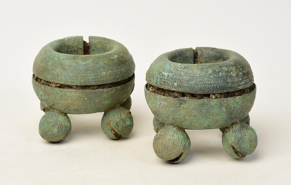 A pair of Dong Son bronze bangles with very nice green patina, decorated with bells and circular design which is the typical design of Dong Son bronze.

Age: Cambodia, Dong Son Period, 500 B.C.
Size: height 8.5 - 9 cm / width 11.5 - 11.7