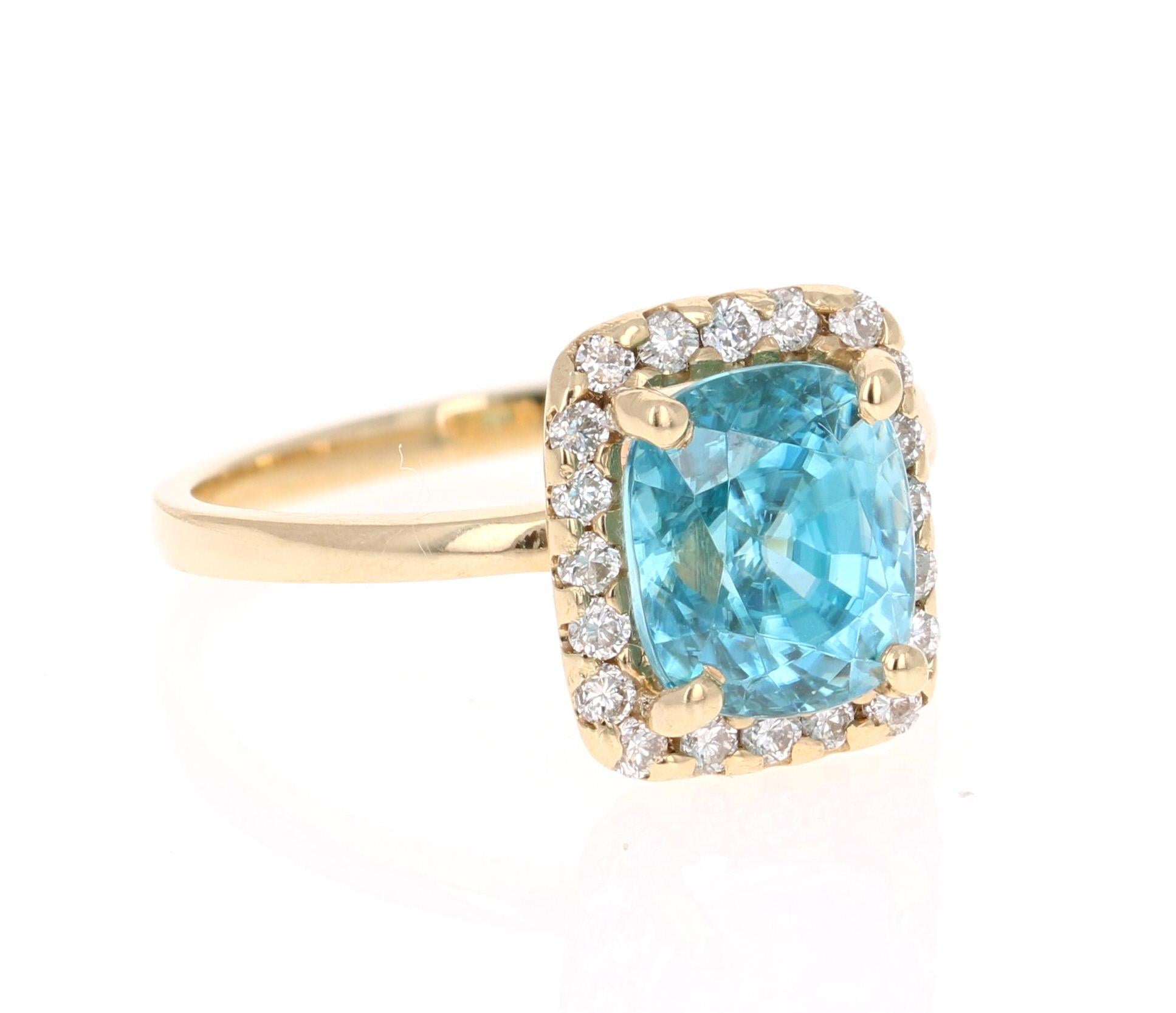A beautiful Blue Zircon and Diamond ring that can be a nice Engagement ring or just an everyday ring!
Blue Zircon is a natural stone mined mainly in Sri Lanka, Myanmar, and Australia.  
This ring has a beautiful Cushion Cut Blue Zircon that weighs