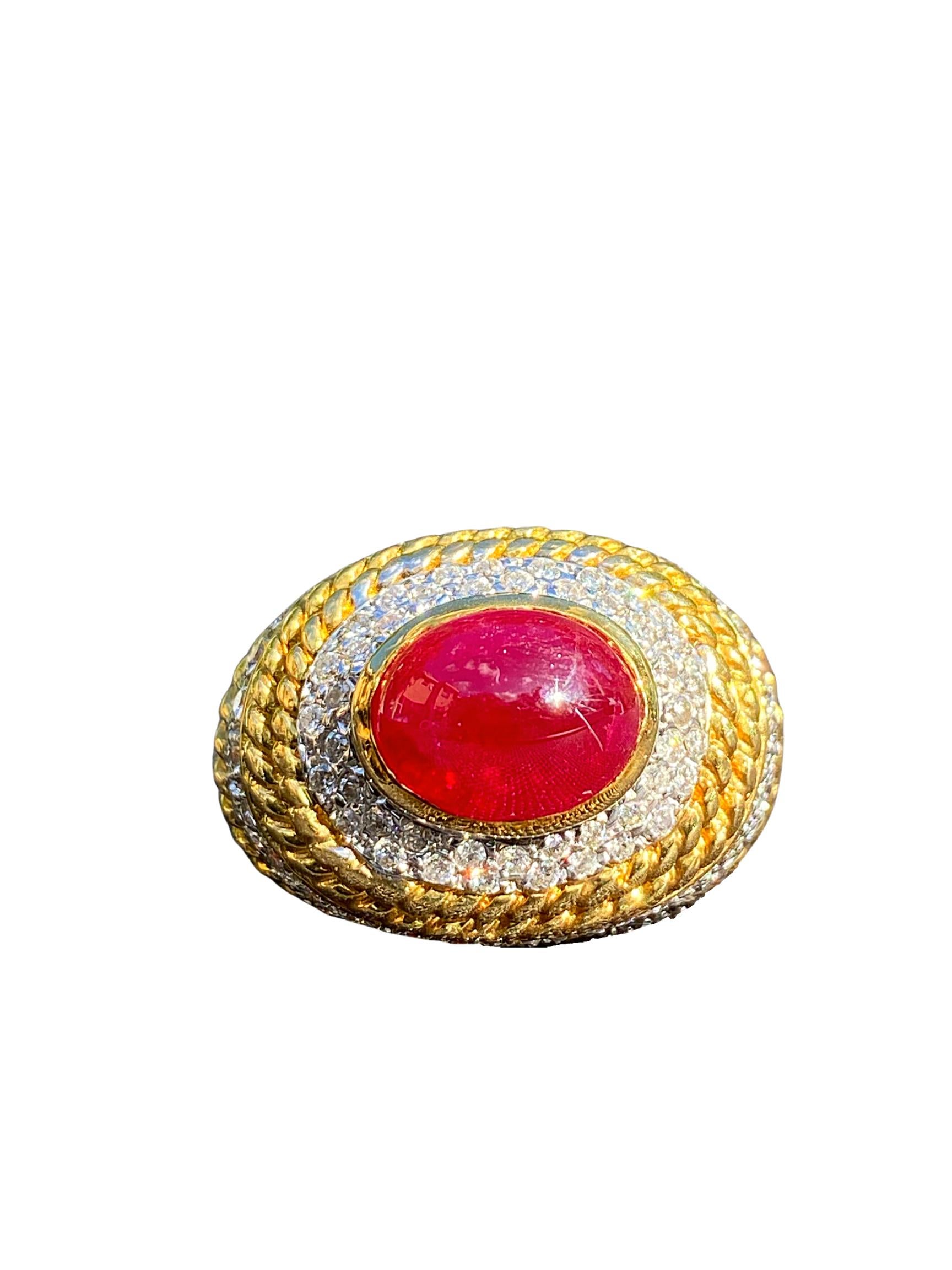 Centering a roughly ~3.00 Carat Cabochon-Cut Ruby, accented by around ~2.00 Carats Round-Brilliant Cut Diamonds, and set in an 18K Yellow Gold and White Gold blend, this ring is a true unisex classic!

Details:
✔ Center Stone: Ruby
✔ Stone Cut: