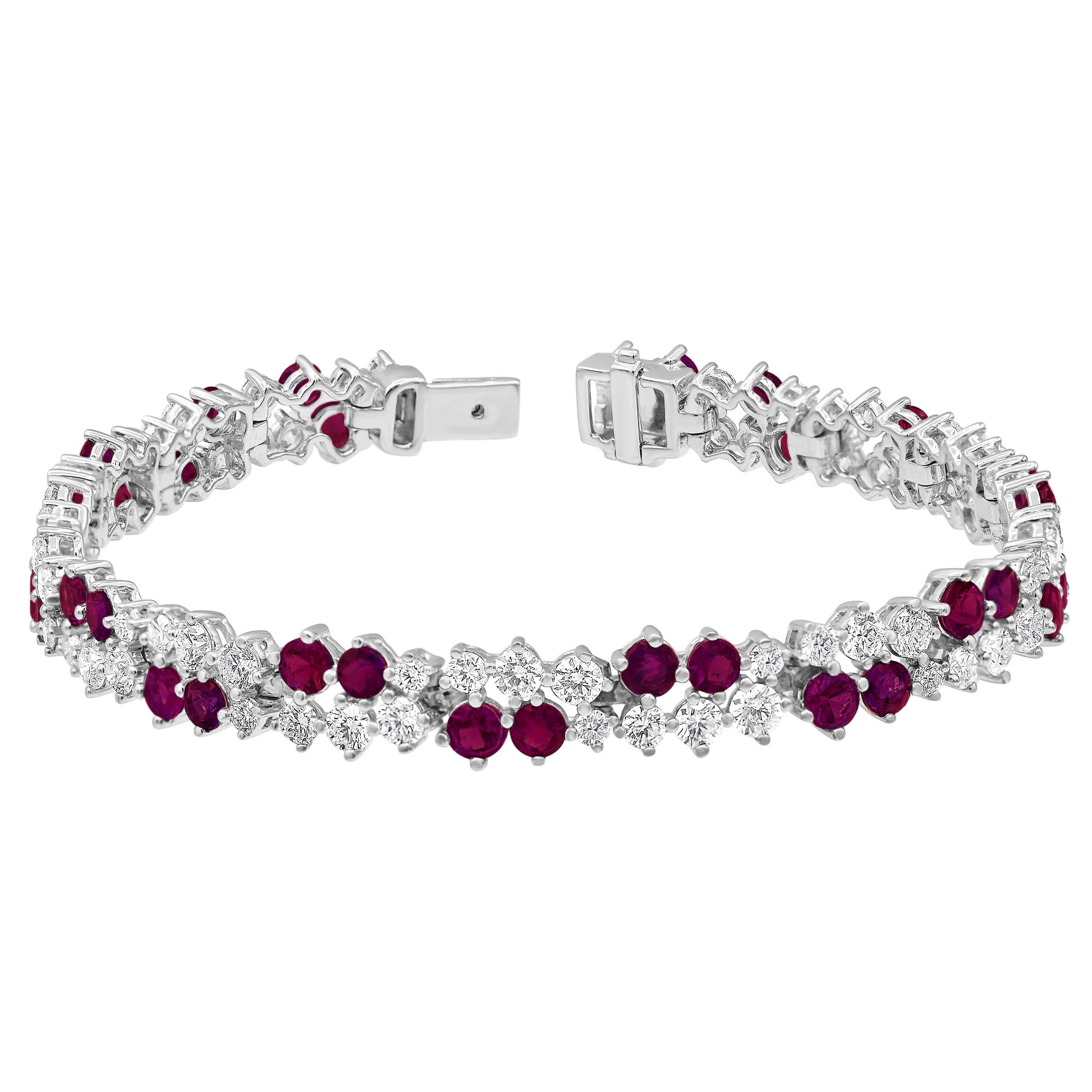 Regal splendor radiates from every angle of this 18k white gold bracelet as strings of round 5.00ct diamond with HI-I1
quality surrounded by delicate two rubies each set with 4 pairs of diamonds, linking each other in two-line making a breathtaking