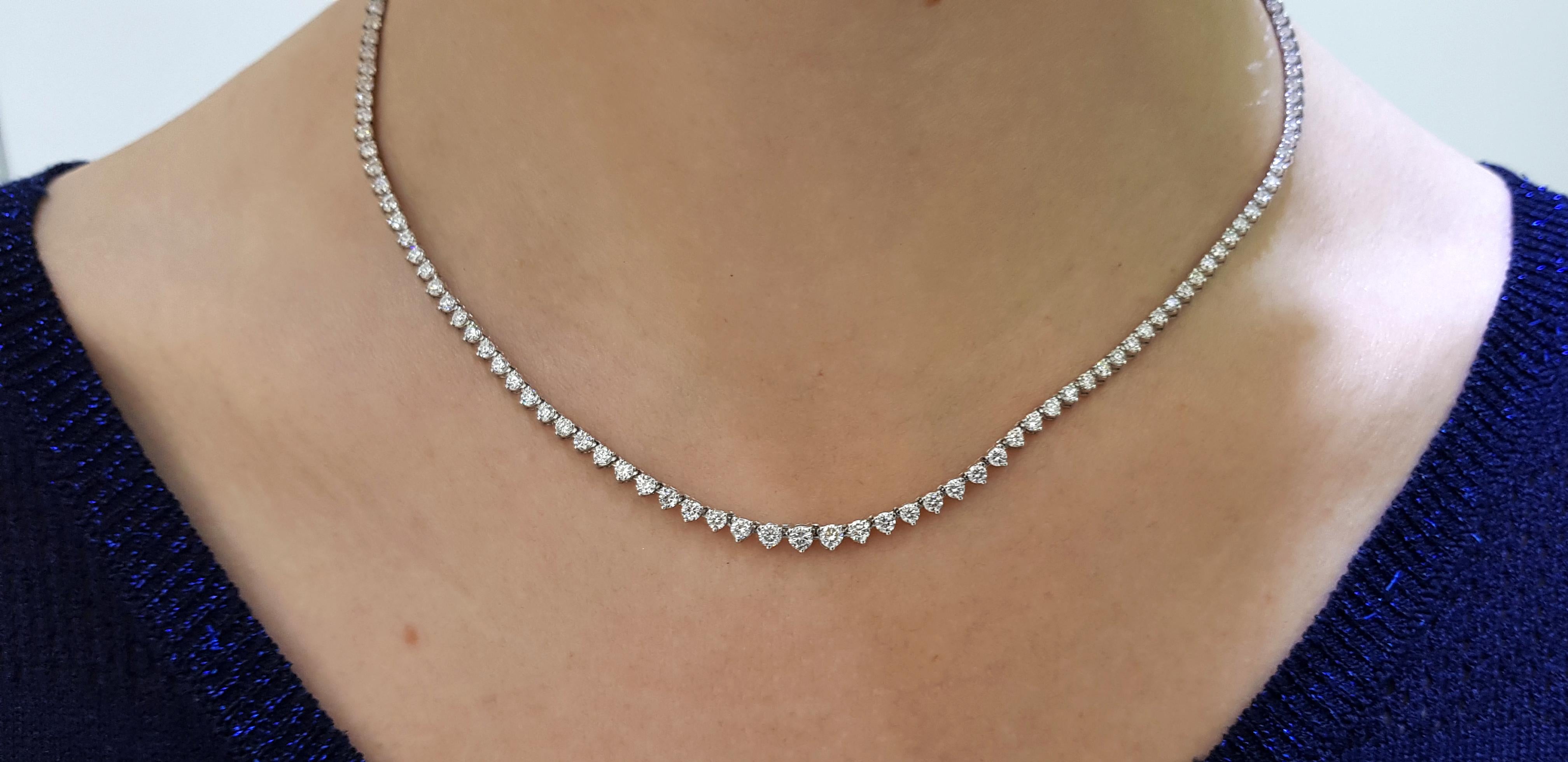 This stunning and impressive Riviera Necklace features total Diamond weight of 5.00 Carat in beautifully graduated Round Brilliant Cut gems with a sparkly white color G/H clarity SI. Each stone has a three claw setting with open gallery and set in