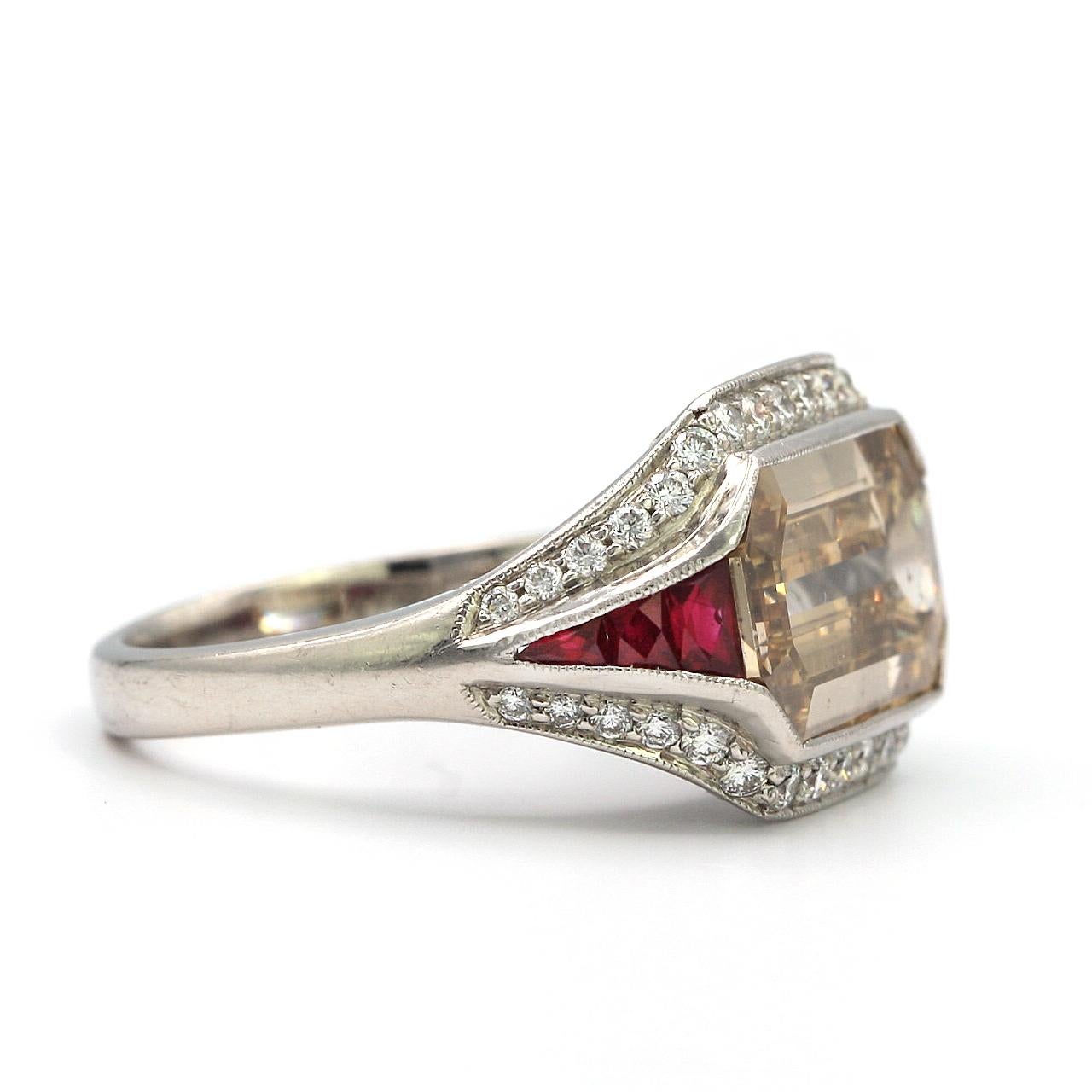 5.00 Carat Emerald Cut Diamond with Rubies in Platinum Ring In Good Condition For Sale In Los Angeles, CA