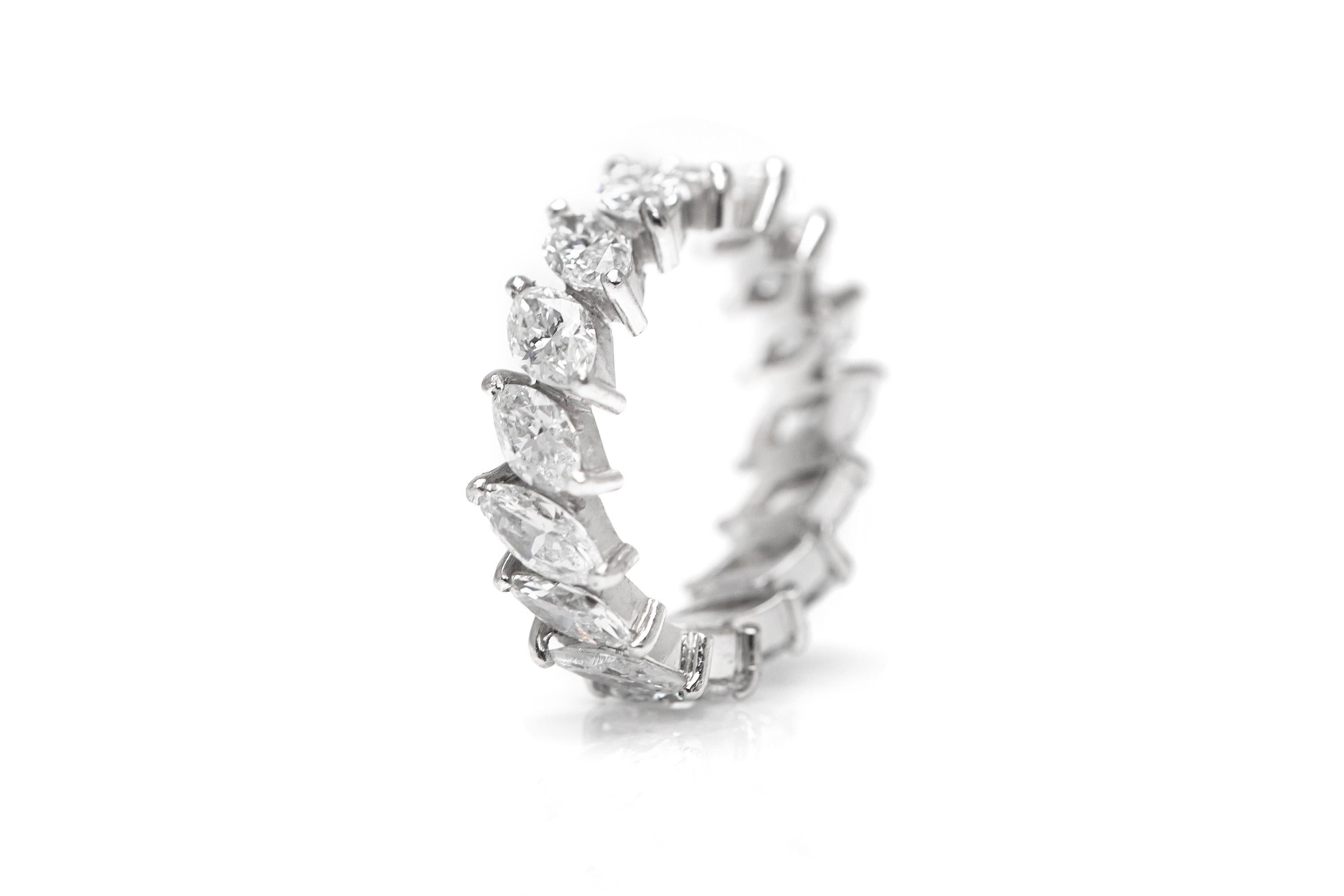 Finely crafted in platinum featuring approximately 5.00 carats of slanted marquise cut diamonds. Each stone weighs approximately 0.30 carat.
