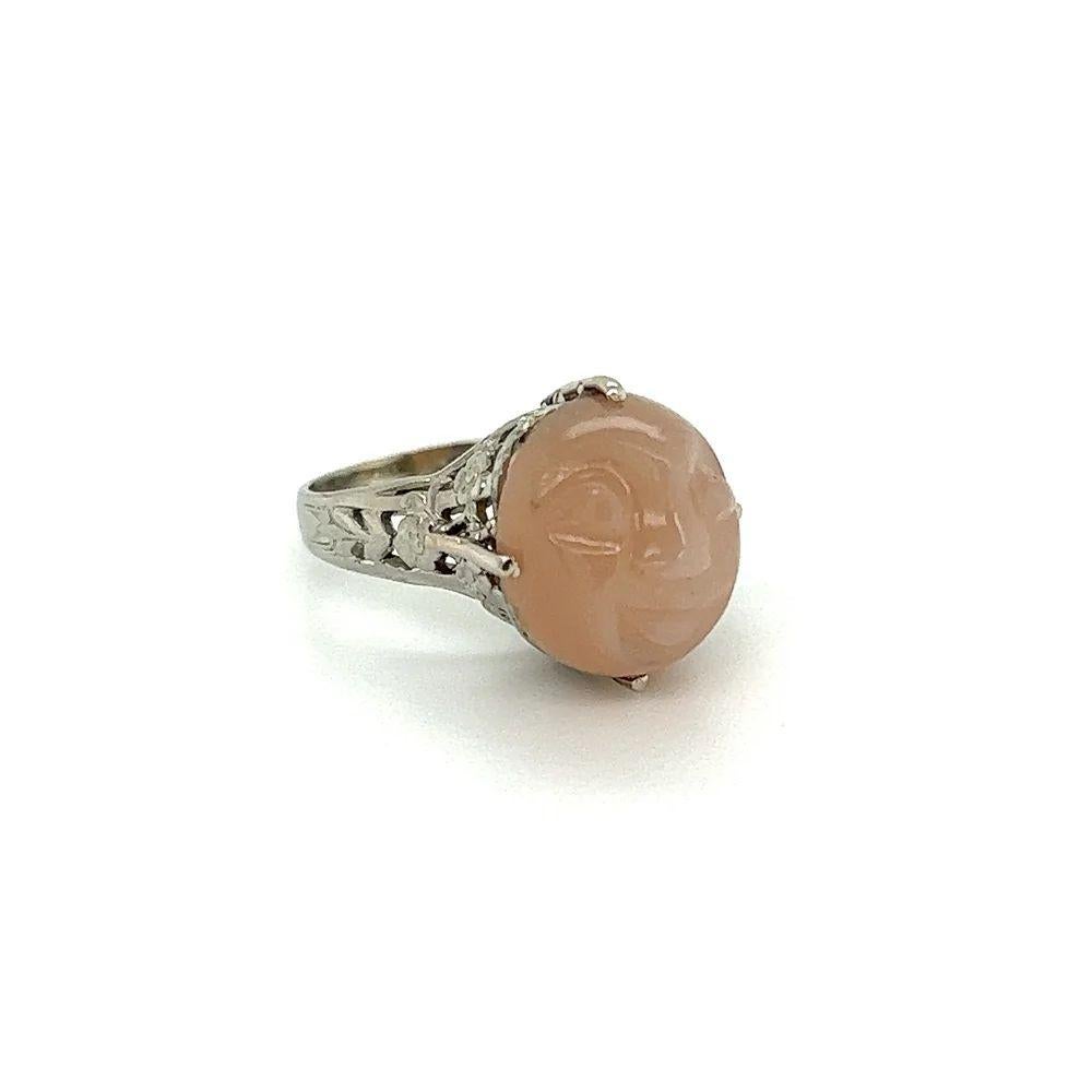 Simply Beautiful! Vintage Art Deco Solitaire Carved Moon Face Moonstone Vintage Solitaire Gold Cocktail Ring. Centering a securely nestled 5 Carat Carved Moon Face Moonstone Hand set in a 18K White Gold Hand crafted mounting. Ring size 3.5, we offer