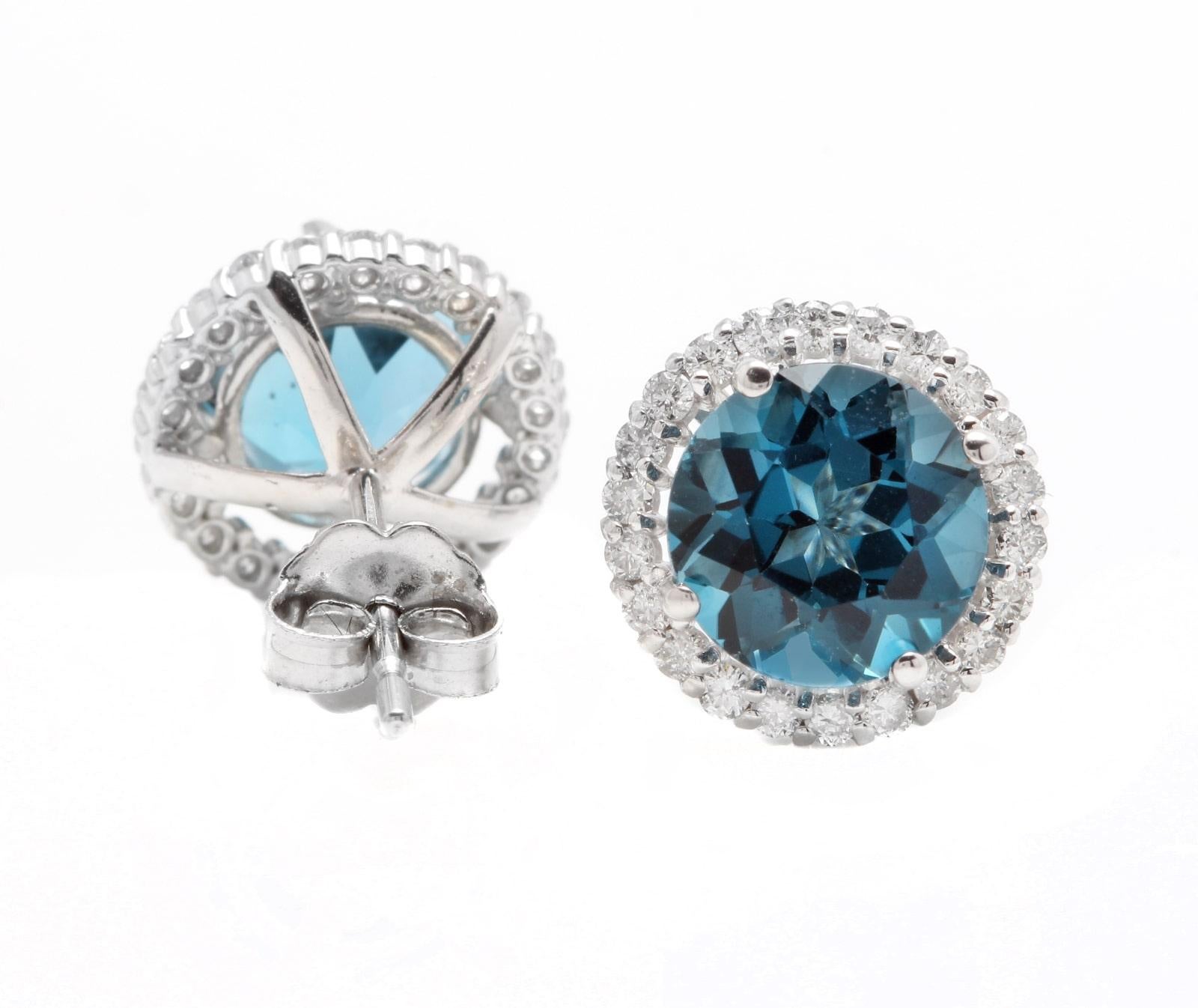 5.00 Carats Natural London Blue Topaz and Diamond 14K Solid White Gold Stud Earrings

Amazing looking piece!

Total Natural Round Cut White Diamonds Weight: 0.50 Carats (color G-H / Clarity SI1-SI2)

Total Natural Round Cut London Blue Topazes