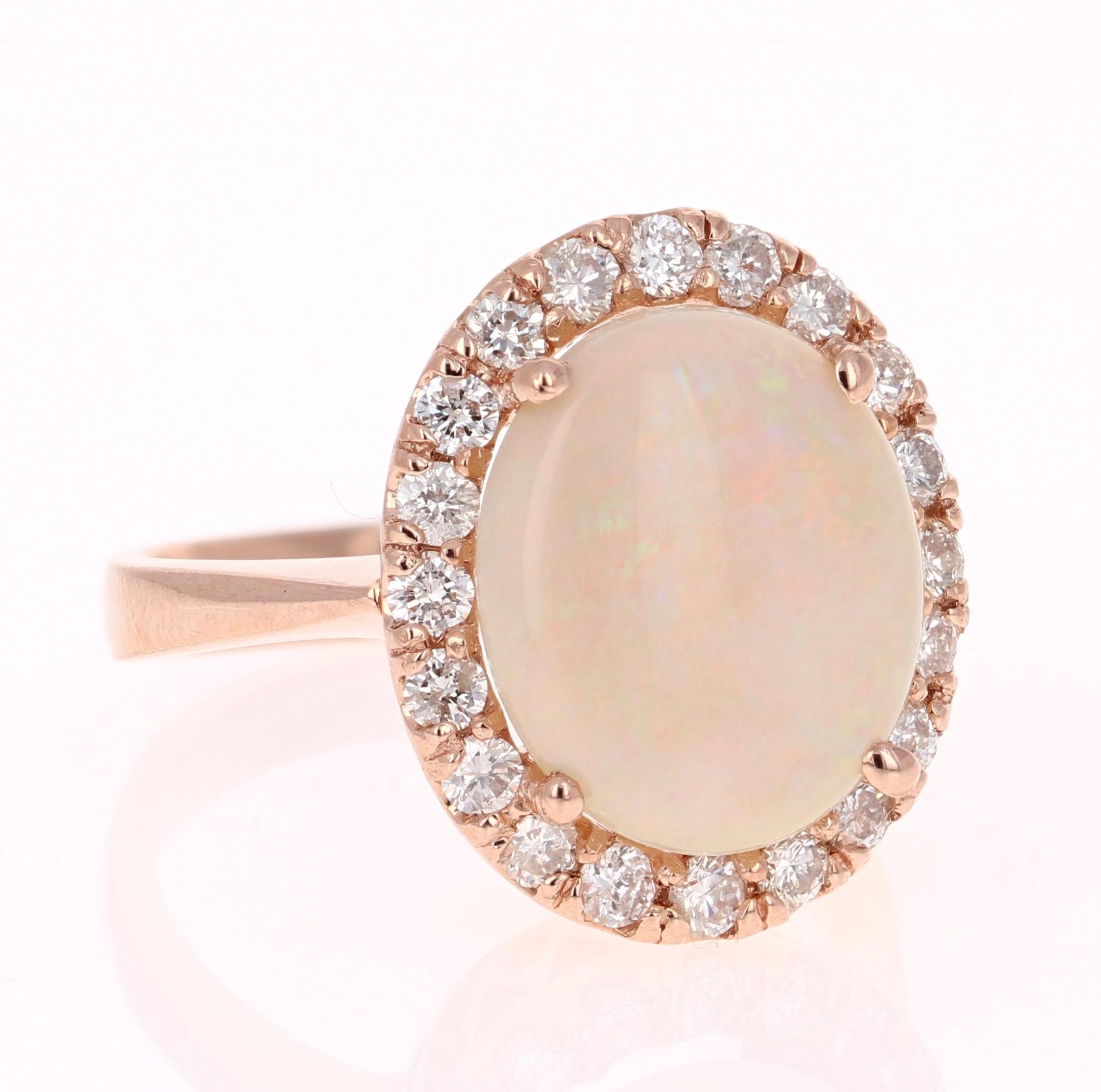 5.00 Carat Oval Cut Opal Diamond Rose Gold Engagement Ring!

Opulent Ethiopian Opal and Diamond Ring made in a 14K Rose Gold setting.  The Oval Cut Opal in this Ring weighs 4.18 carats and is surrounded by 21 Round Cut Diamonds that weigh 0.82 carat