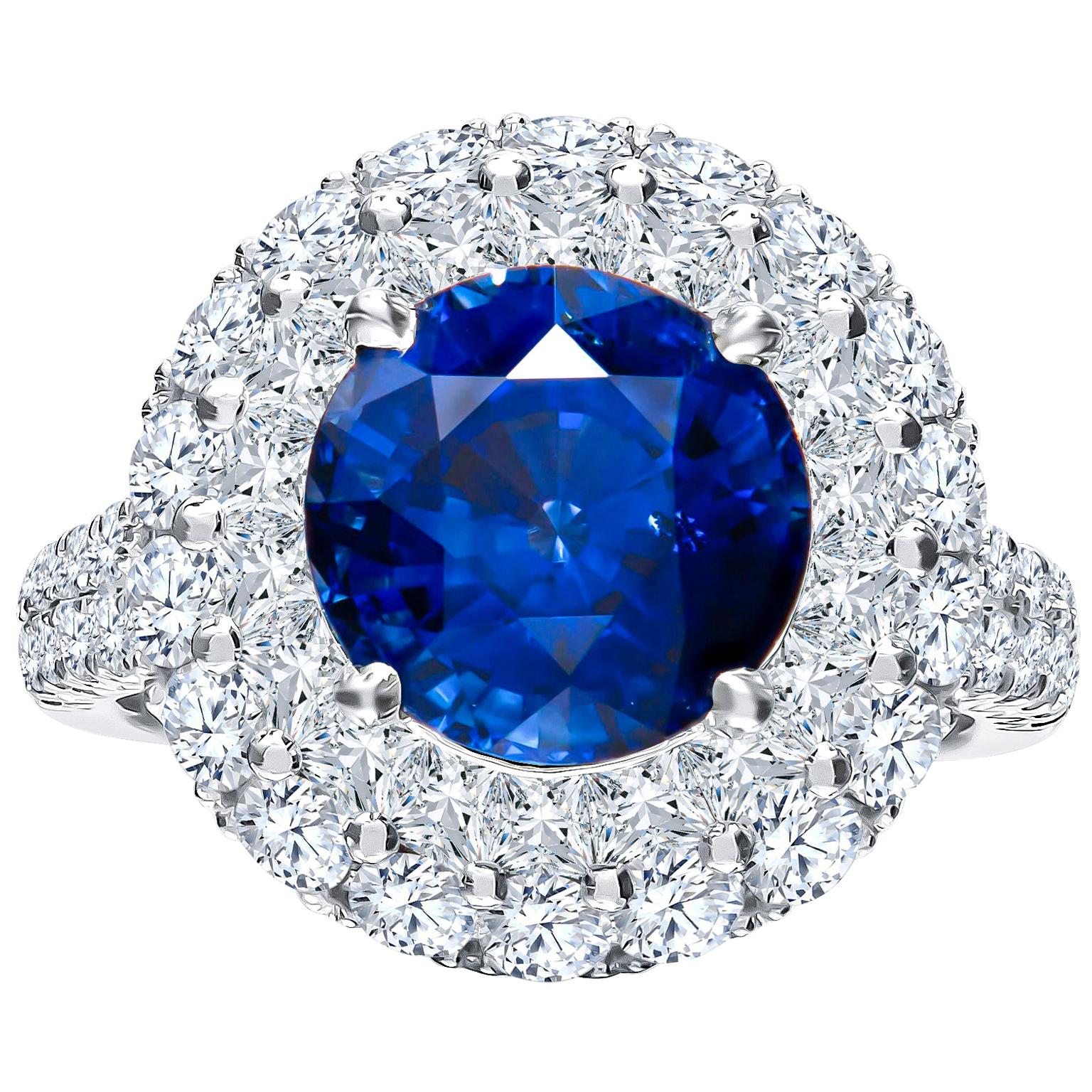 5.00 Carat Round Natural Blue Sapphire and 2.63 Carat Total Diamond Ring, 18K For Sale