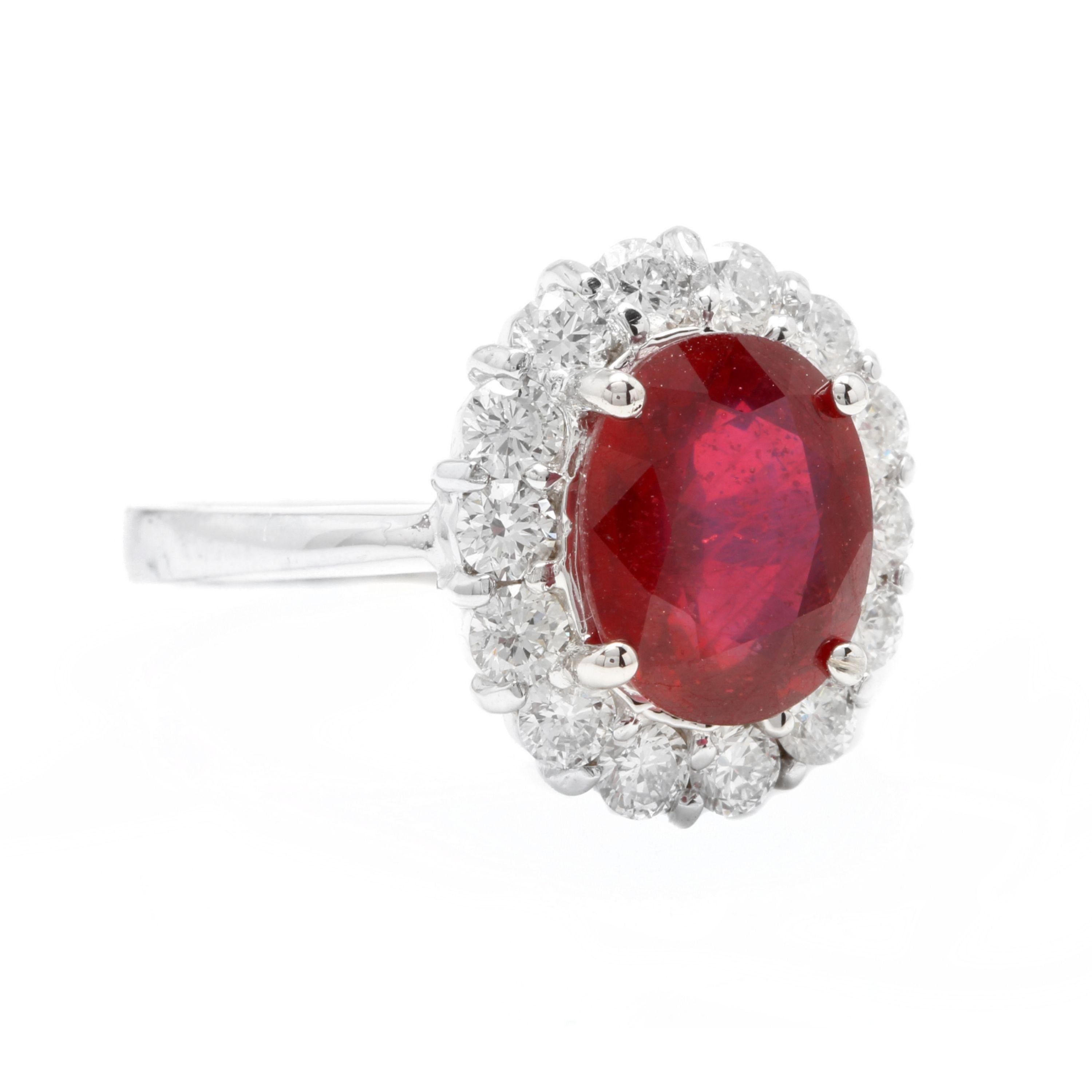 5.00 Carats Impressive Red Ruby and Natural Diamond 14K White Gold Ring

Total Red Ruby Weight is Approx. 4.00 Carats

Ruby Treatment: Lead Glass Filling

Ruby Measures: Approx. Approx. 10.00 x 8.00mm

Natural Round Diamonds Weight: Approx. 1.00
