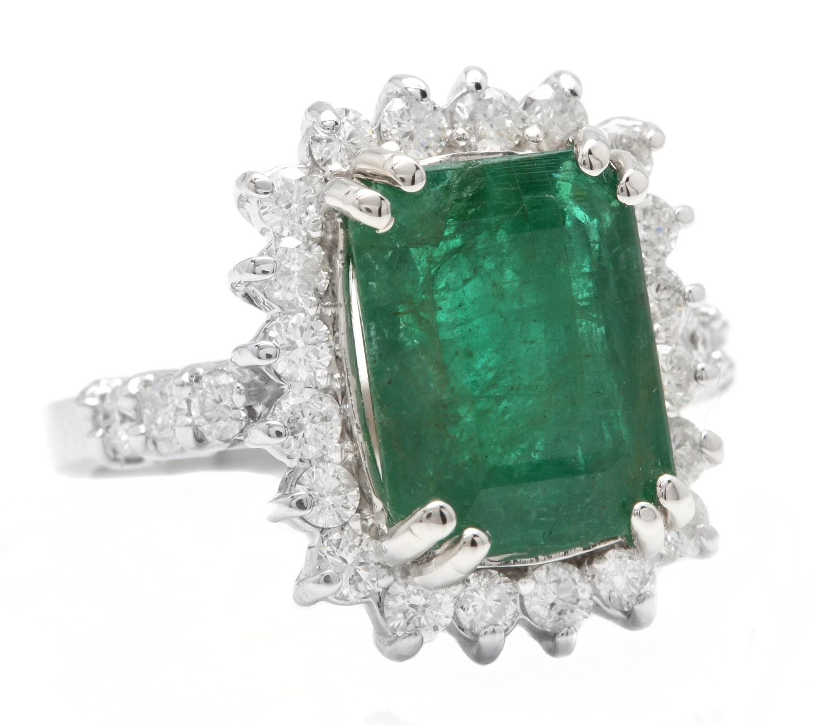 5.00 Carats Natural Emerald and Diamond 14K Solid White Gold Ring

Suggested Replacement Value: $7,500.00

Total Natural Green Emerald Weight is: Approx. 4.00 Carats (transparent) 

Emerald Measures: Approx. 11.20 x 9.20mm

Natural Round Diamonds