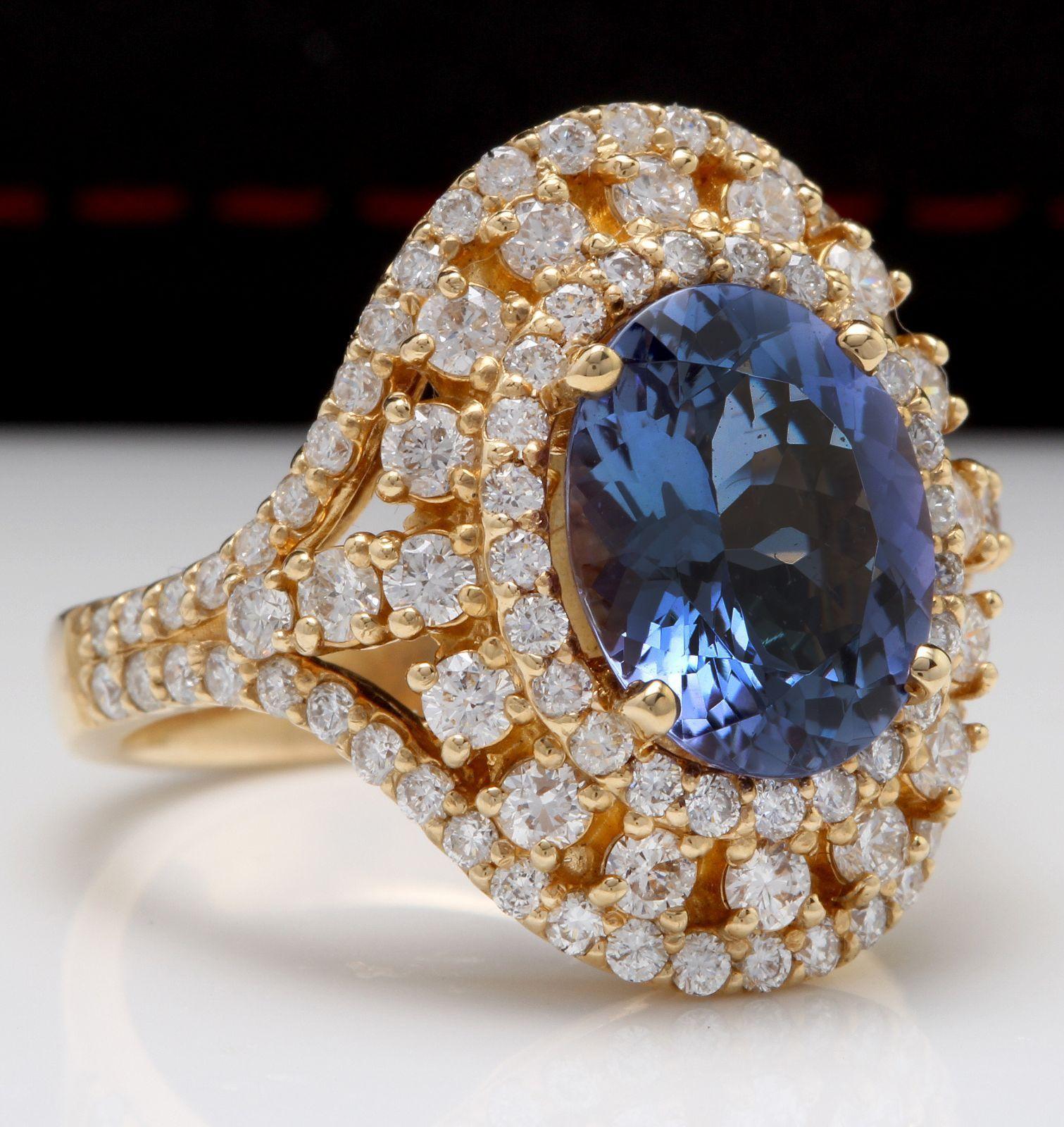 5.00 Carats Natural Splendid Tanzanite and Diamond 14K Solid Yellow Gold Ring

Total Natural Oval Cut Tanzanite Weight is: Approx. 3.50 Carats

Natural Round Diamonds Weight: Approx. 1.50 Carats (color G-H / Clarity SI1-2)

Ring size: 7 (we offer