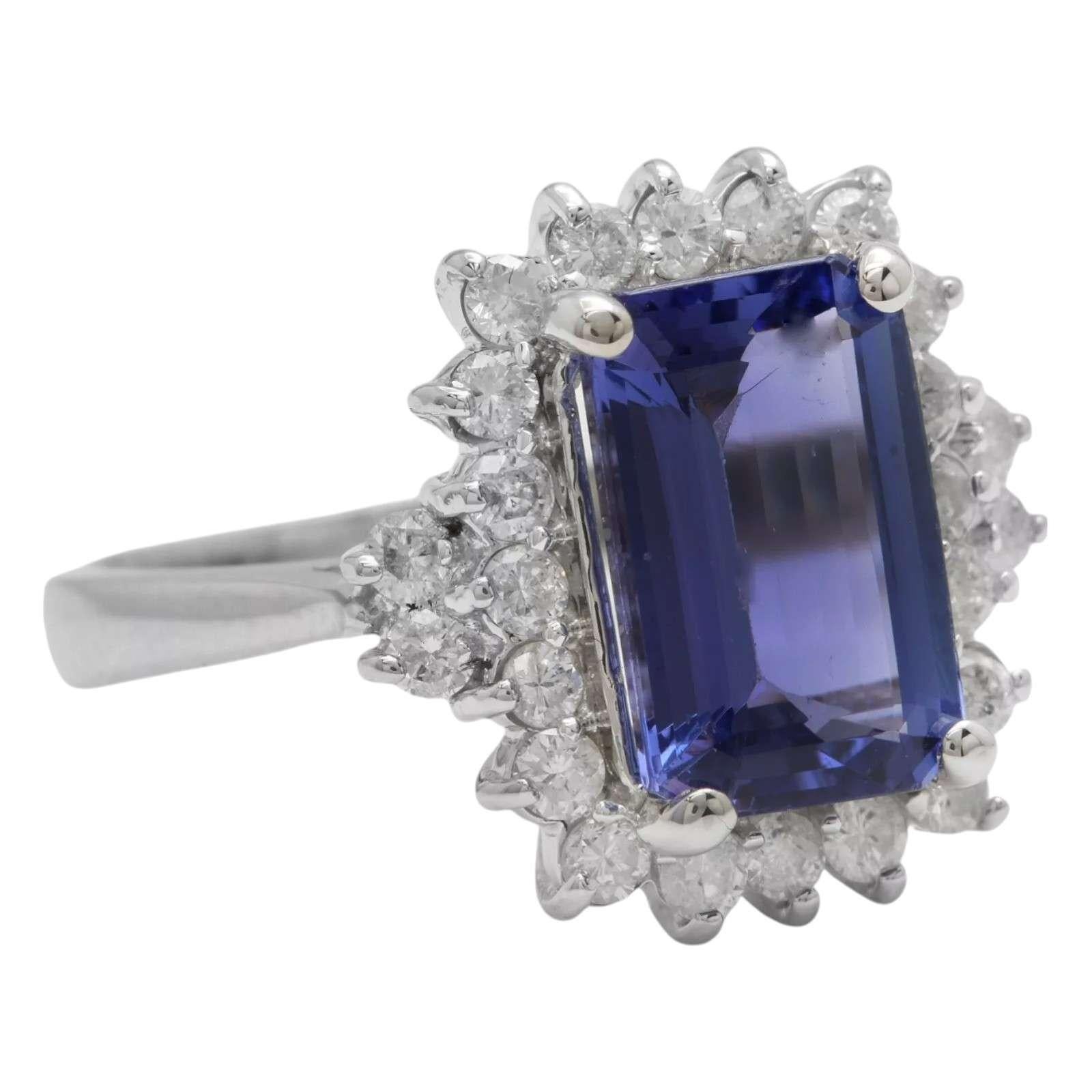  Anillo de oro blanco macizo de 14 quilates con tanzanita y diamantes de 5,00 quilates naturales y muy bonito aspecto


El peso total de la tanzanita natural talla esmeralda es: Aprox. 4.20 Quilates 

Medidas de la tanzanita: Aprox. 11,70 x