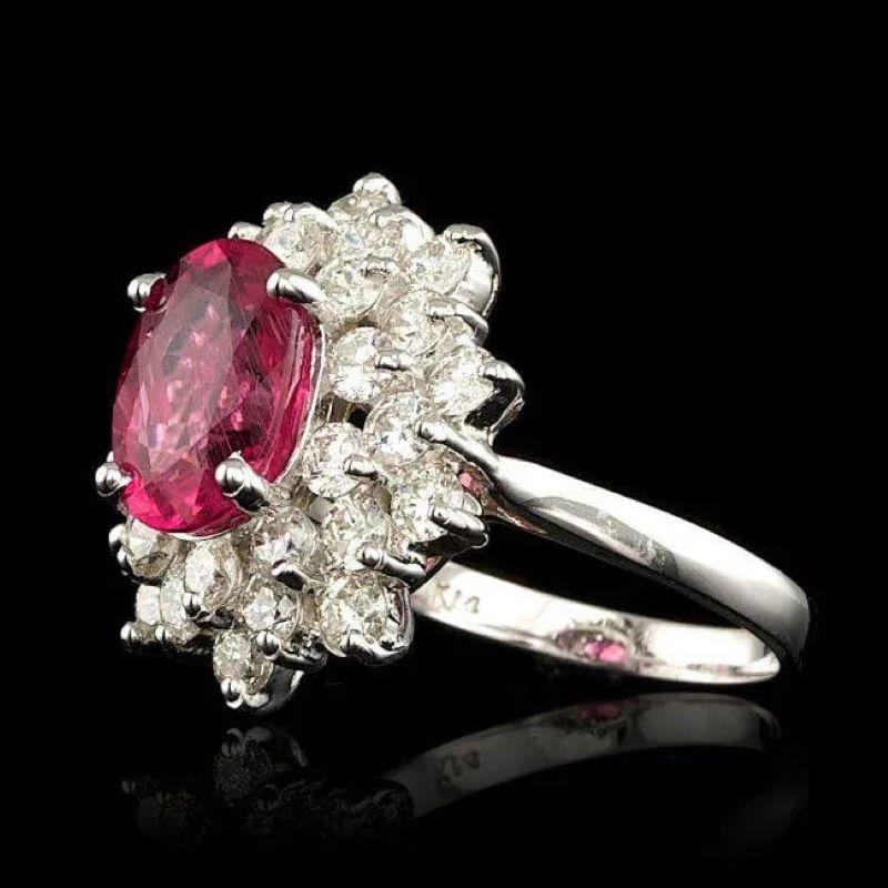 5.00 Carats Natural Tourmaline and Diamond 14K Solid White Gold Ring

Total Natural Oval Tourmaline Weight is: Approx. 2.90 Carats

Tourmaline Measures: Approx. 10.00 x 8.00mm

Natural Round Diamonds Weight: Approx. 2.10 Carats (color G-H / Clarity